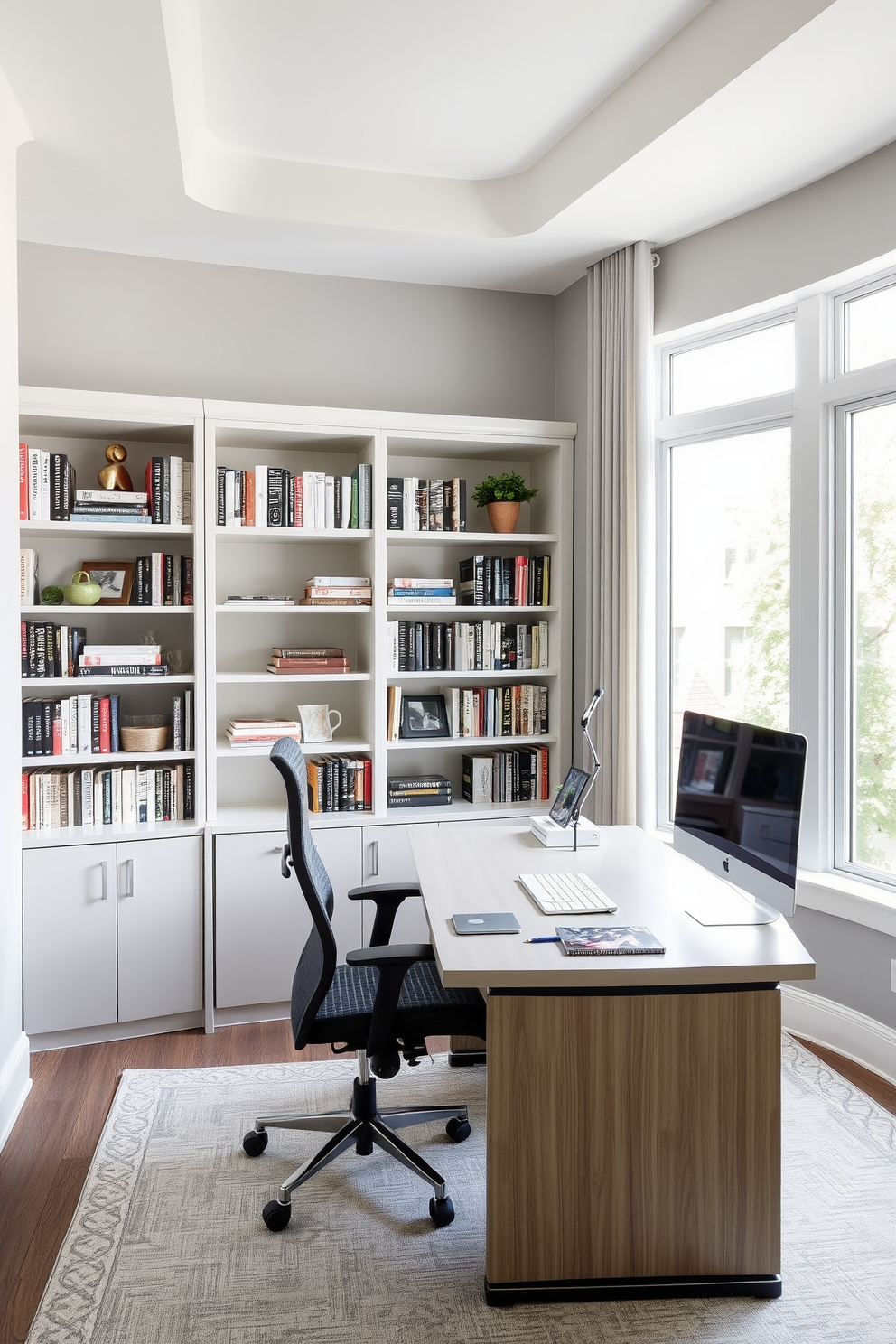 A modern study room features a sleek desk with a comfortable ergonomic chair positioned near a large window that allows natural light to flood the space. The walls are painted in a soft gray tone, creating a calming atmosphere, while a stylish bookcase filled with neatly arranged books and decorative items adds both storage and character to the room.