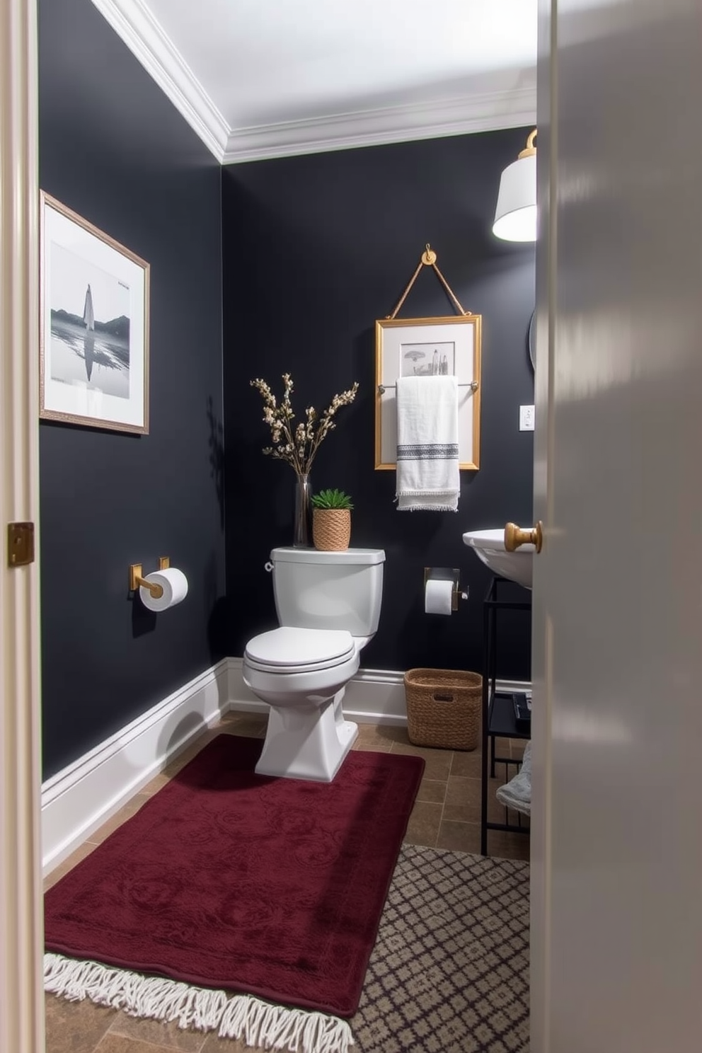 Layered rugs create a cozy atmosphere in a moody powder room. The base rug is a deep, rich color, while a smaller, patterned rug adds texture and interest on top. Dark walls painted in a deep navy or charcoal set the tone for this intimate space. Accents of gold or brass in fixtures and accessories add a touch of elegance and sophistication.