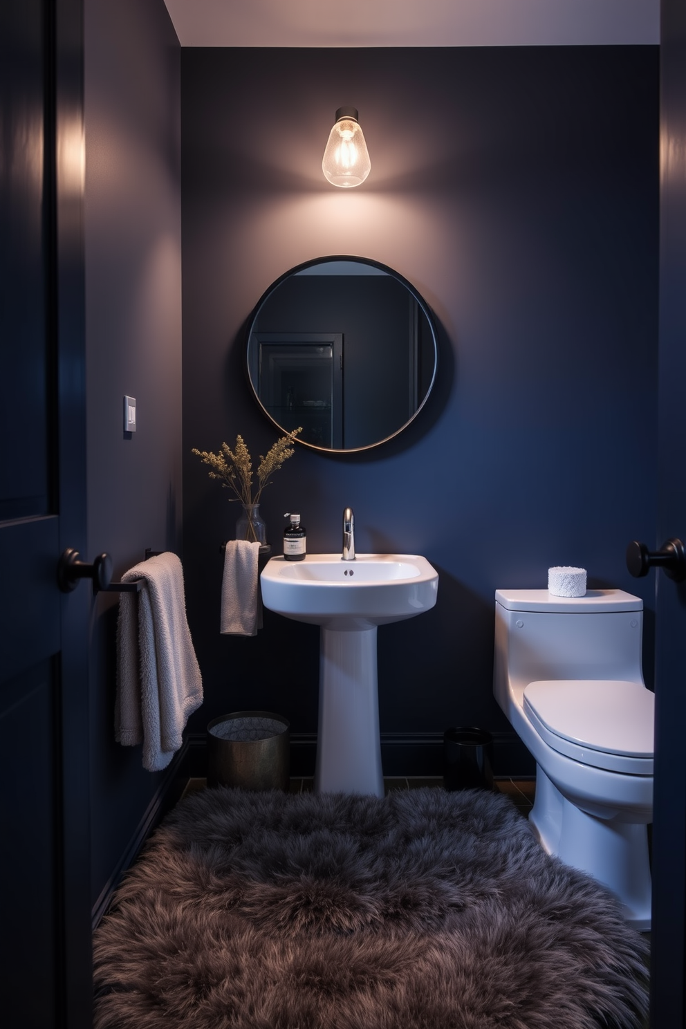 A rustic powder room featuring reclaimed wood elements creates a warm and inviting atmosphere. The walls are adorned with weathered wood panels, and a vintage-style sink is mounted on a reclaimed wood vanity. Soft lighting illuminates the space, highlighting the natural textures and tones of the wood. A round mirror with a distressed frame hangs above the sink, complementing the rustic aesthetic.