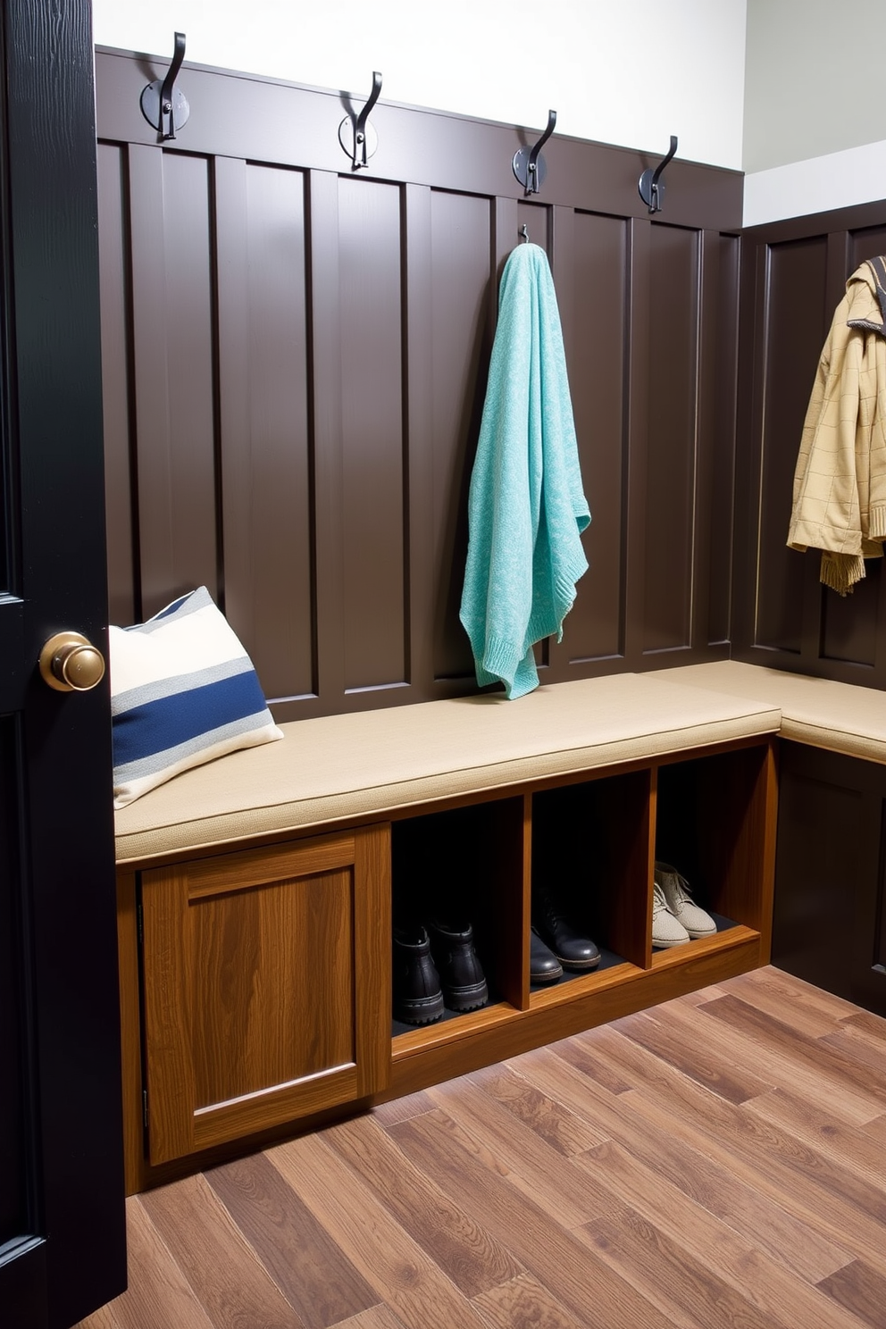 A custom bench is positioned in the mudroom, featuring a beautifully crafted family name plaque elegantly displayed on the backrest. The bench is made of reclaimed wood, showcasing a rustic finish that adds warmth to the space.