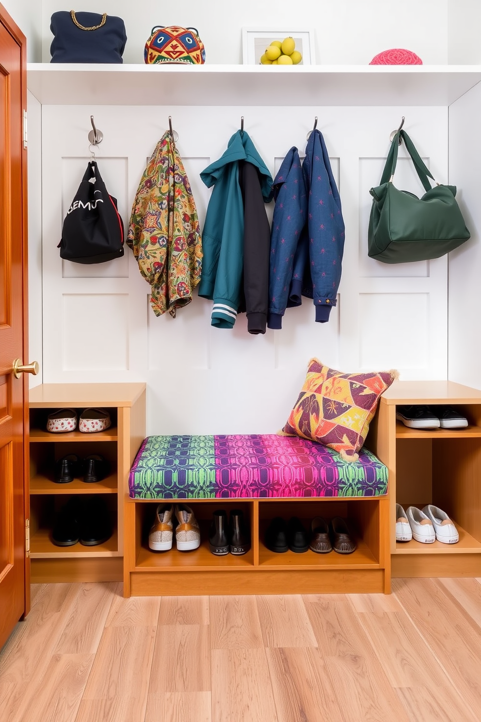 A vintage trunk serves as a charming mudroom bench, offering both functionality and style. The trunk is adorned with intricate brass hardware and features a weathered wood finish that adds character to the space. Surrounding the bench are hooks for coats and a small shelf for shoes, creating an organized entrance. The walls are painted in a soft cream color, enhancing the inviting atmosphere of the mudroom.