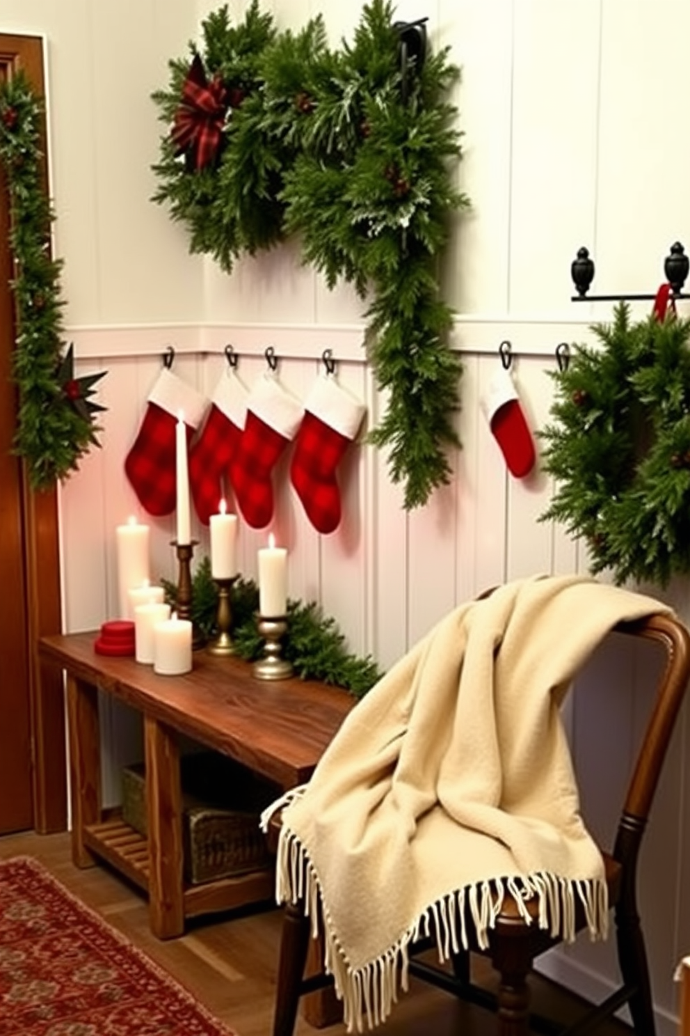 A warm and inviting mudroom decorated for the holidays features an array of holiday candles in various heights arranged on a rustic wooden bench. The walls are adorned with festive garlands and stockings, while a cozy throw blanket is draped over a nearby chair to enhance the seasonal charm.