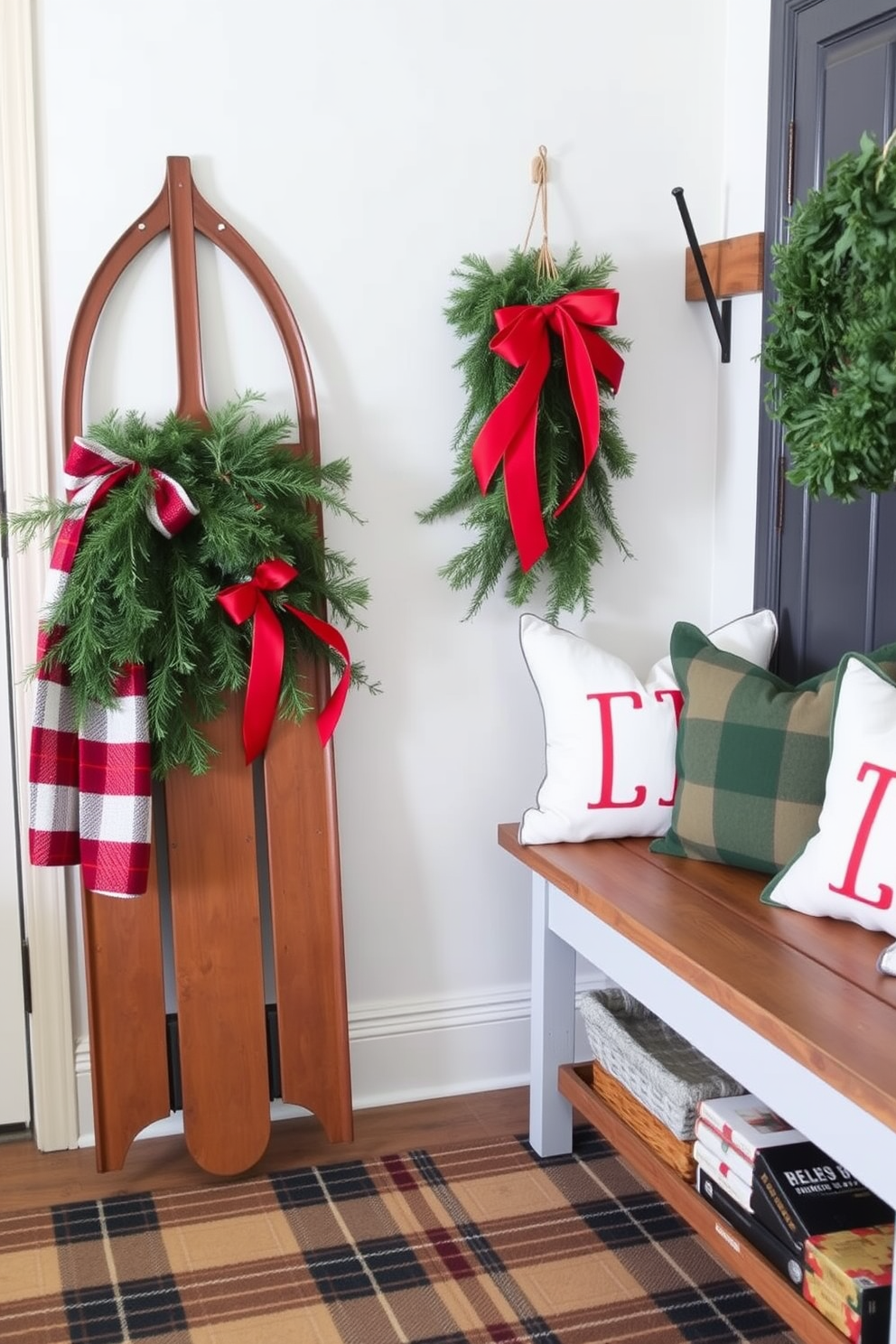 A vintage sled leans against the wall in the mudroom, adorned with evergreen branches and red ribbon. The floor is covered with a cozy plaid rug, and nearby, a wooden bench is topped with festive throw pillows.