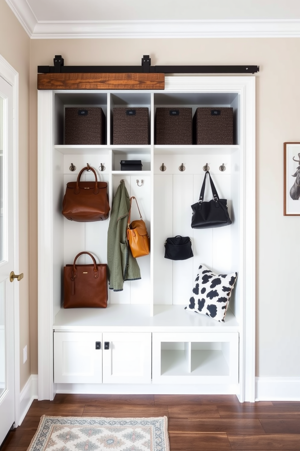 A stylish mudroom featuring a sliding barn door that adds a rustic charm while saving space. The closet is designed with built-in shelves and hooks for optimal organization, complemented by a warm wood finish.