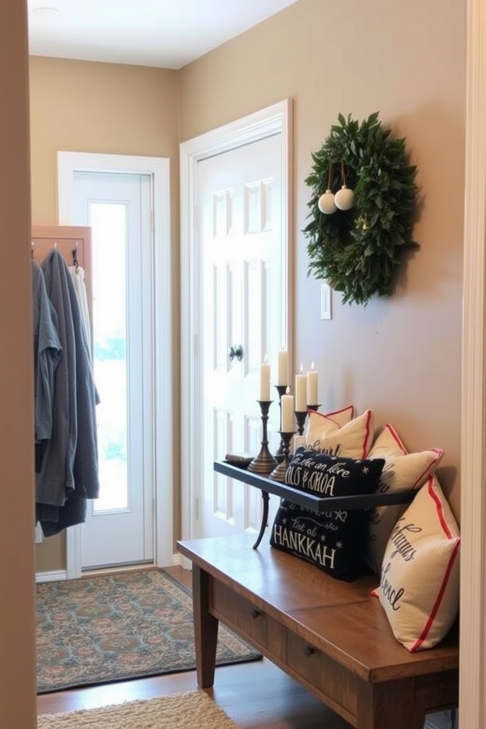 A cozy mudroom adorned with seasonal pillows featuring festive motifs. The walls are painted in a warm neutral tone, and a wooden bench is placed against one side, inviting guests to sit and remove their shoes. Decorative elements include a wreath made of greenery and ornaments hanging on the door. A small table displays a collection of candles and holiday-themed decor, creating a welcoming atmosphere for the Hanukkah season.