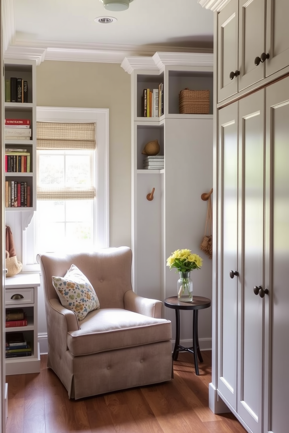 A charming mudroom features a cozy reading nook with a plush armchair and a small side table. Natural light pours in through a nearby window, illuminating the space adorned with built-in shelves filled with books and decorative items. The mudroom is conveniently located near the dining room, designed with functional storage solutions such as hooks and cabinets for shoes and coats. Soft, neutral colors create a warm and inviting atmosphere, seamlessly connecting the mudroom to the dining area.