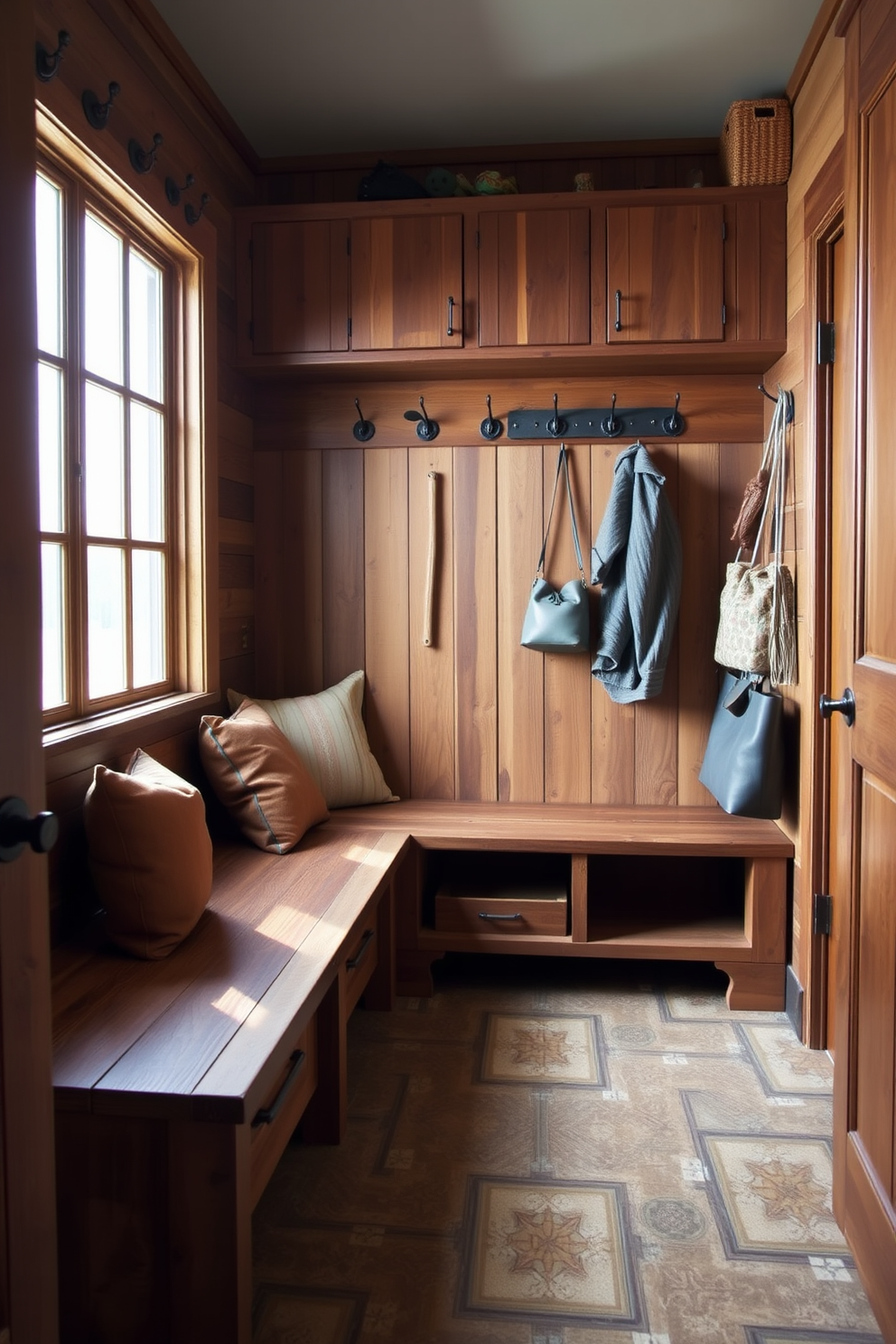 A charming mudroom with rustic finishes that exudes a cozy feel. The space features reclaimed wood cabinetry, a built-in bench with plush cushions, and a collection of vintage hooks for hanging coats and bags. Natural light floods the room through a large window, illuminating the warm tones of the wood and the earthy color palette. The floor is covered with durable, patterned tiles that complement the rustic aesthetic while providing practicality for a high-traffic area.