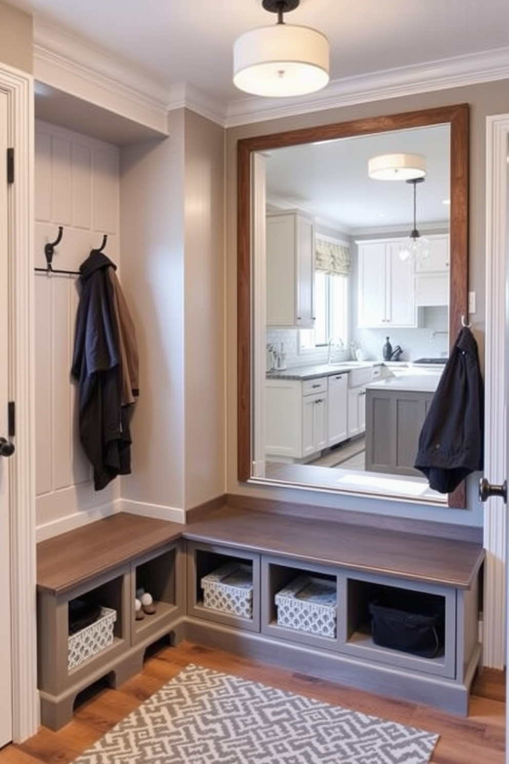 A functional mudroom design featuring a large mirror for quick outfit checks. The space includes built-in benches with storage underneath and hooks for hanging coats, located conveniently near the kitchen.