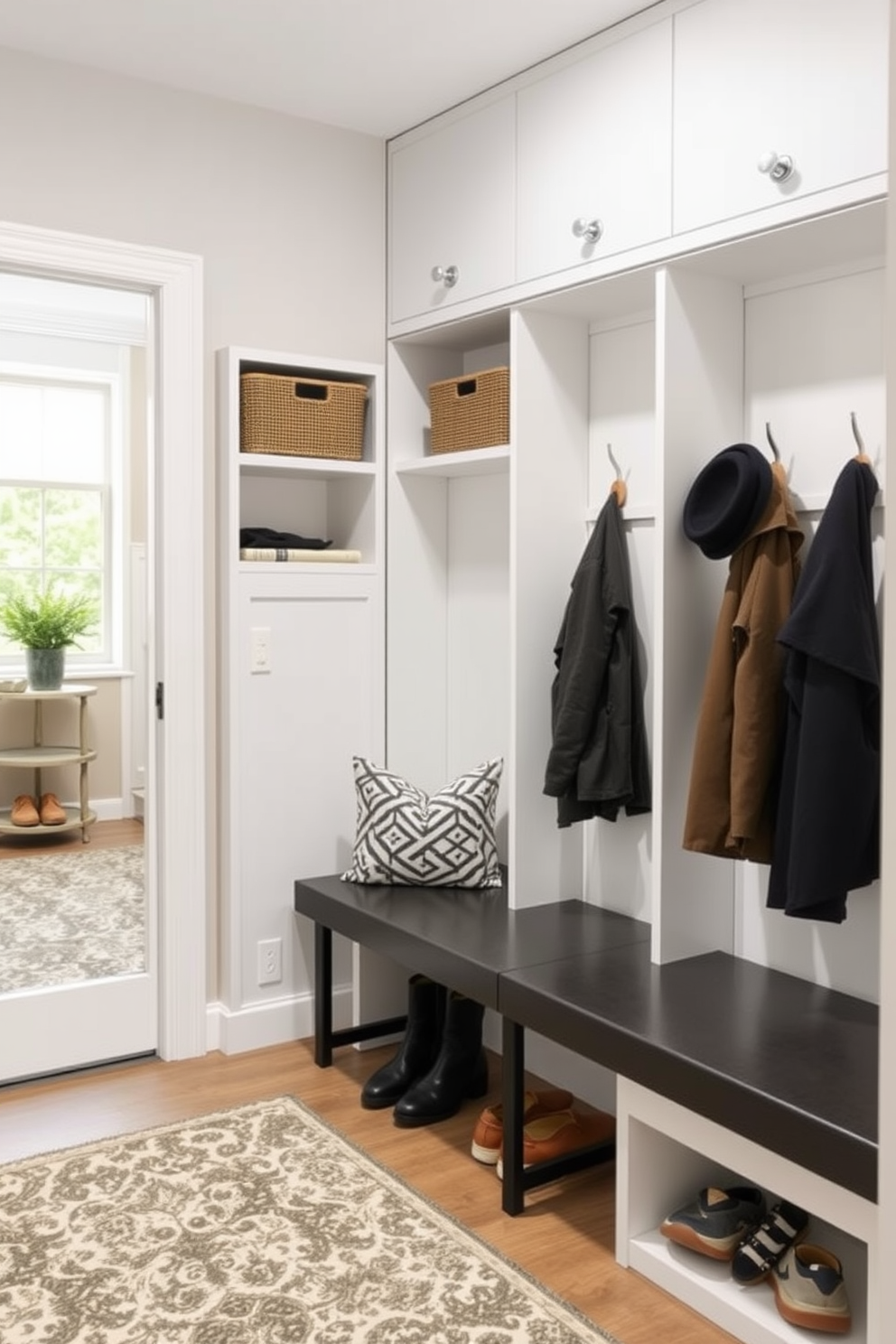 A mudroom design featuring a mirrored wall to enhance space perception. The area includes built-in cubbies for shoes and coats, with a sleek bench for seating and a stylish rug to add warmth.