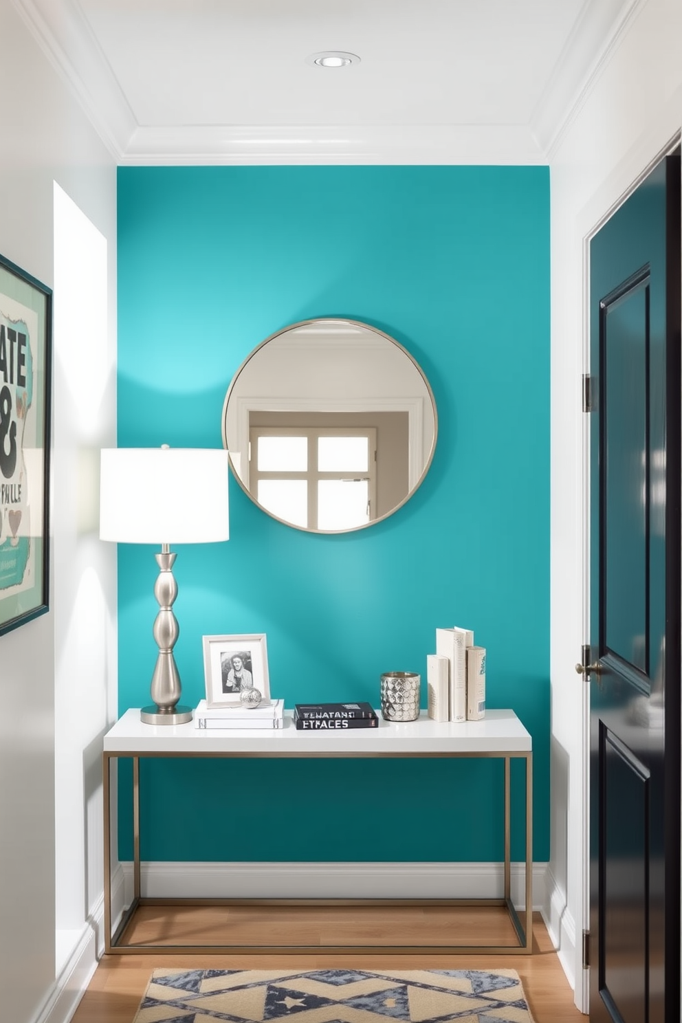 Brightly colored accent wall for impact. The wall features a vibrant teal hue that contrasts with the soft white surrounding walls, creating a striking focal point. Narrow foyer design ideas. The space includes a sleek console table against one wall, adorned with a stylish lamp and decorative items, while a round mirror above reflects light and adds depth.