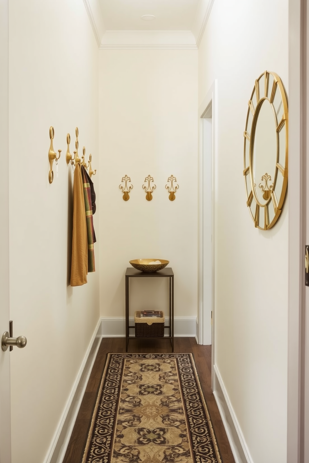 A narrow foyer featuring decorative hooks for keys and bags is designed to maximize space while providing functionality. The walls are painted in a soft pastel shade, and the floor is adorned with a stylish runner that complements the decor. The hooks are made of brushed brass, arranged in an artistic pattern, adding a touch of elegance to the entryway. A small console table sits against the wall, topped with a decorative bowl for loose change and a stylish mirror above to enhance the sense of space.