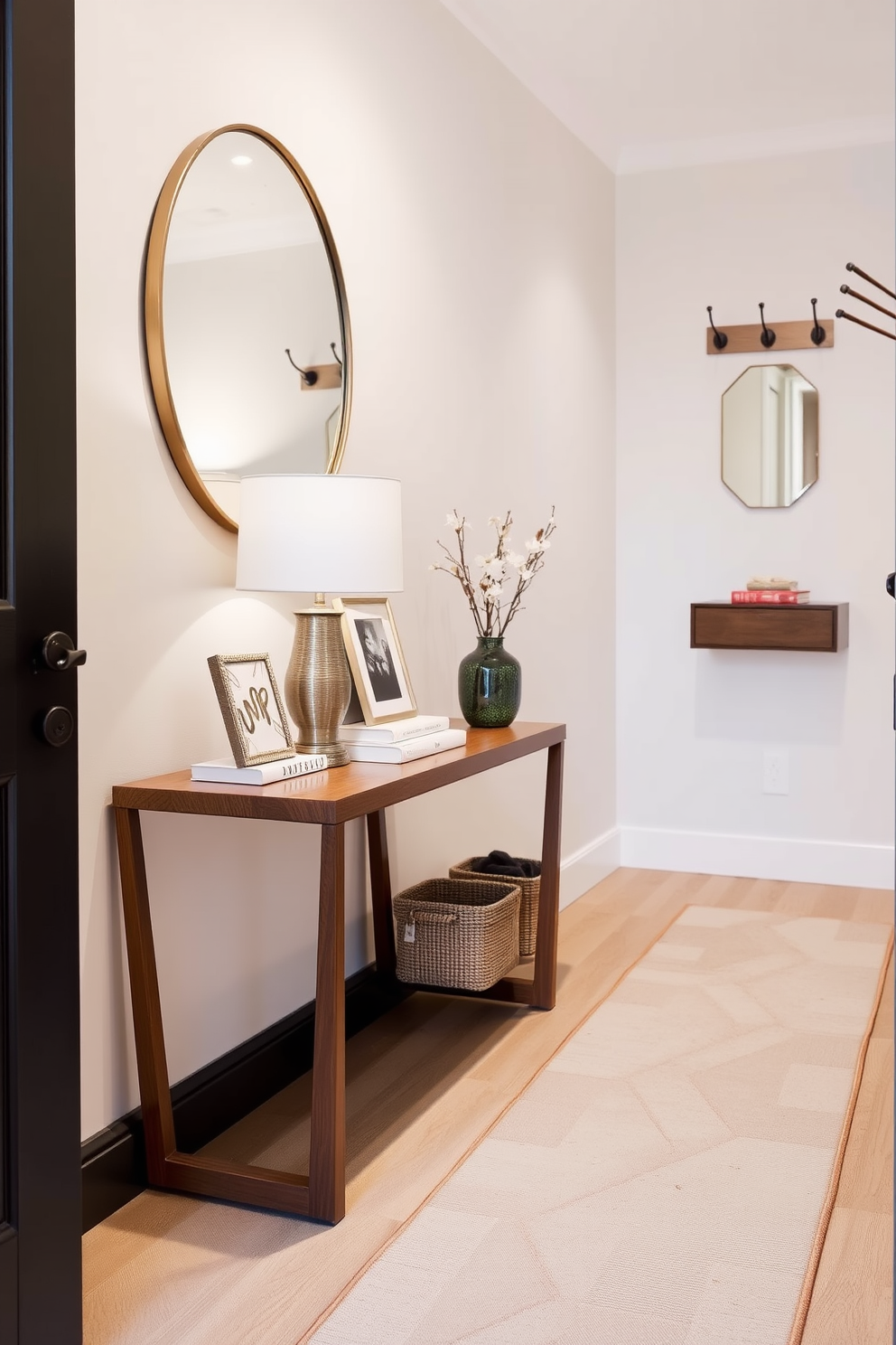 A small side table is positioned against the wall, adorned with decorative items such as a stylish lamp and a few art books. The table features a sleek design in a warm wood finish that complements the surrounding decor. The narrow foyer is designed with a soft color palette, featuring a runner rug that adds warmth and texture. Wall-mounted hooks and a small console mirror enhance functionality while maintaining an elegant aesthetic.