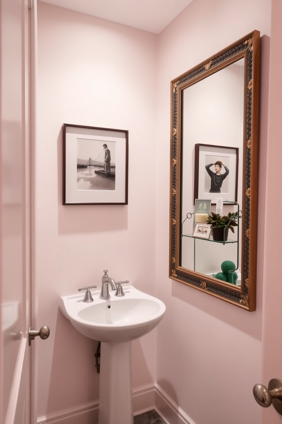 A narrow powder room featuring soft pastel walls that create an inviting atmosphere. The space includes a sleek pedestal sink with a vintage-style faucet and a large framed artwork above it that adds a personal touch. To the right, a tall mirror with a decorative border enhances the room's height. A small, stylish shelf below the mirror holds decorative items and a potted plant, bringing life to the compact area.