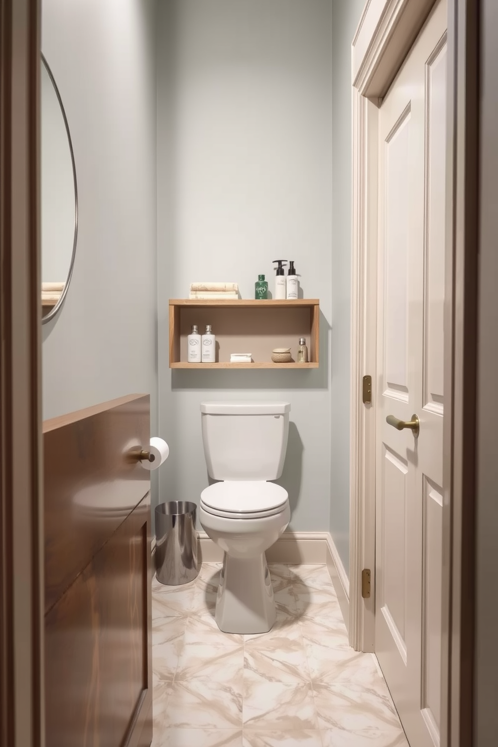 A narrow powder room featuring open shelving for easy access to essentials. The walls are painted in a soft pastel color, and the floor is adorned with elegant, light-colored tiles.