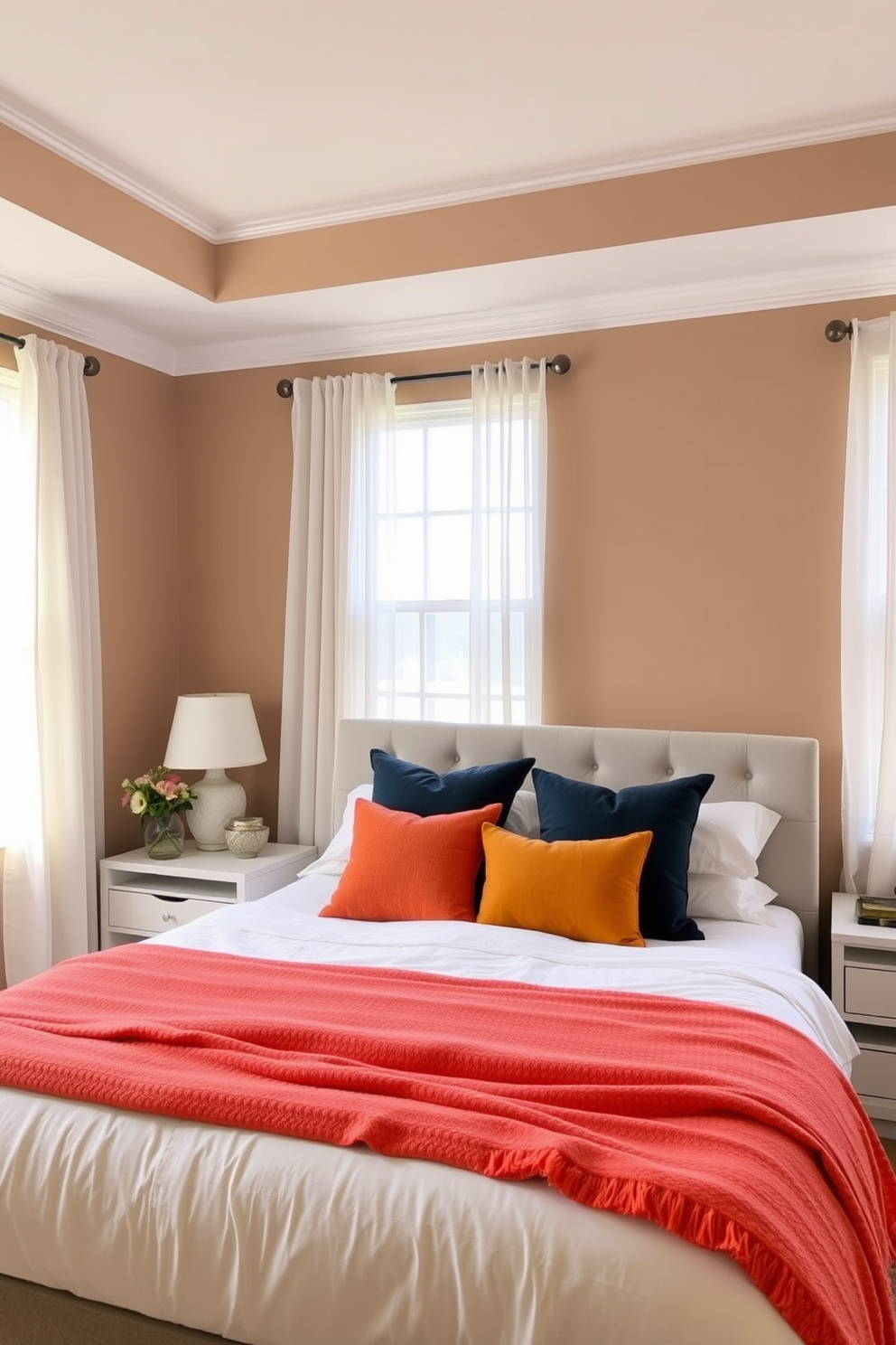 Warm wood floors create an inviting atmosphere in the bedroom. The walls are painted in soft neutral tones, complemented by a plush cream-colored bedspread and decorative pillows. A cozy reading nook is set up by a large window, featuring a comfortable armchair and a small side table. Natural light floods the space, enhancing the serene ambiance of the room.