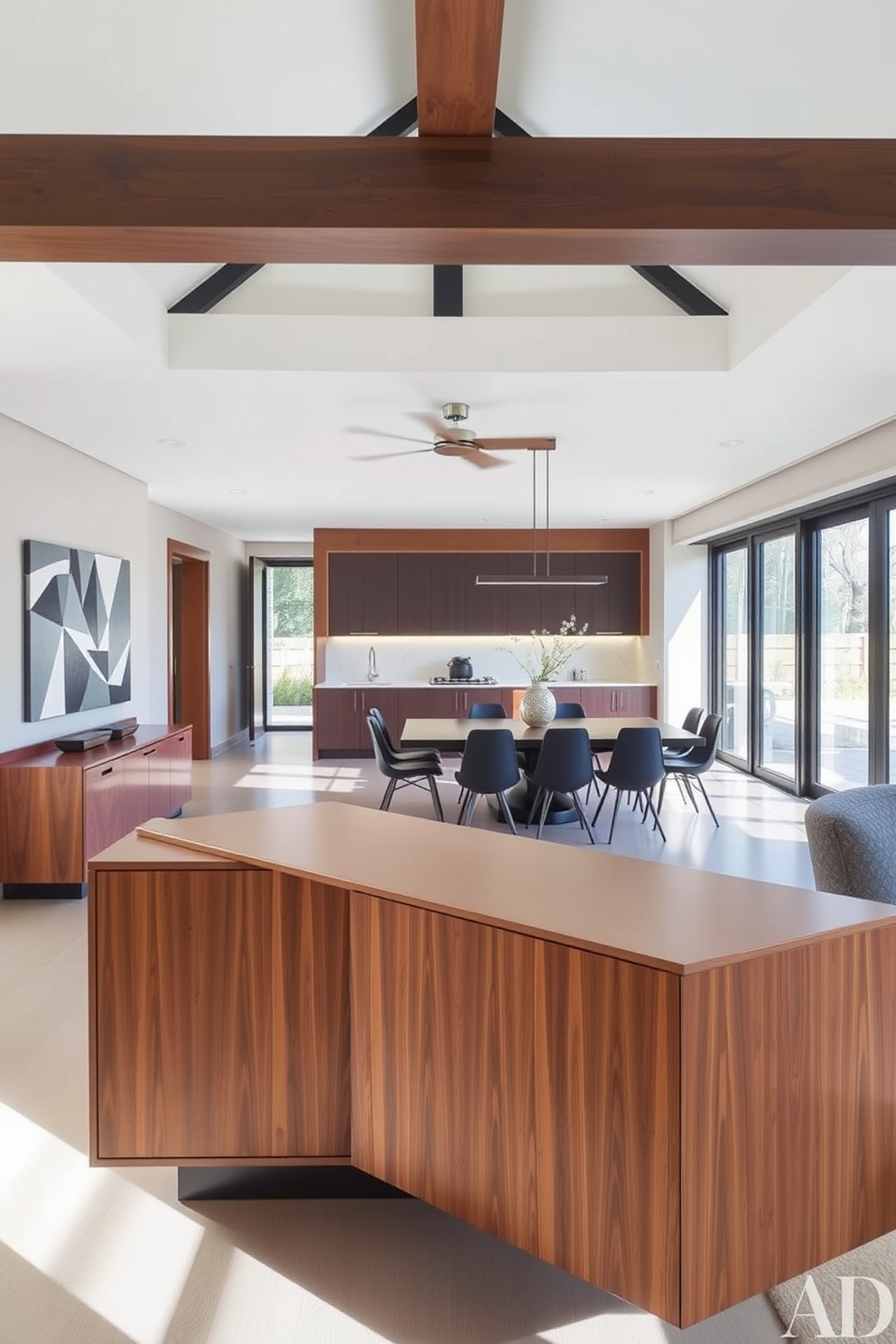 A modern open floor plan dining room featuring a sleek sideboard for extra storage. The room is filled with natural light, showcasing a large dining table surrounded by stylish chairs.