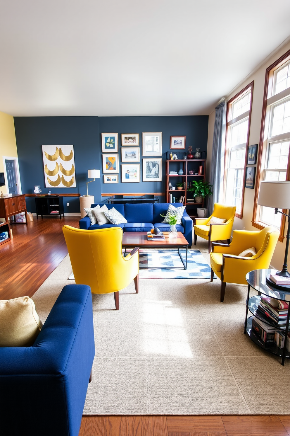 A spacious open floor plan living room features distinct color blocking to create visual separation between areas. The main seating area is adorned with a bold navy blue sofa, complemented by vibrant yellow accent chairs and a geometric area rug that ties the colors together. Natural light floods the space through large windows, highlighting the warm wood tones of the coffee table and shelving. A gallery wall with framed artwork in coordinating colors adds personality and visual interest to the room.