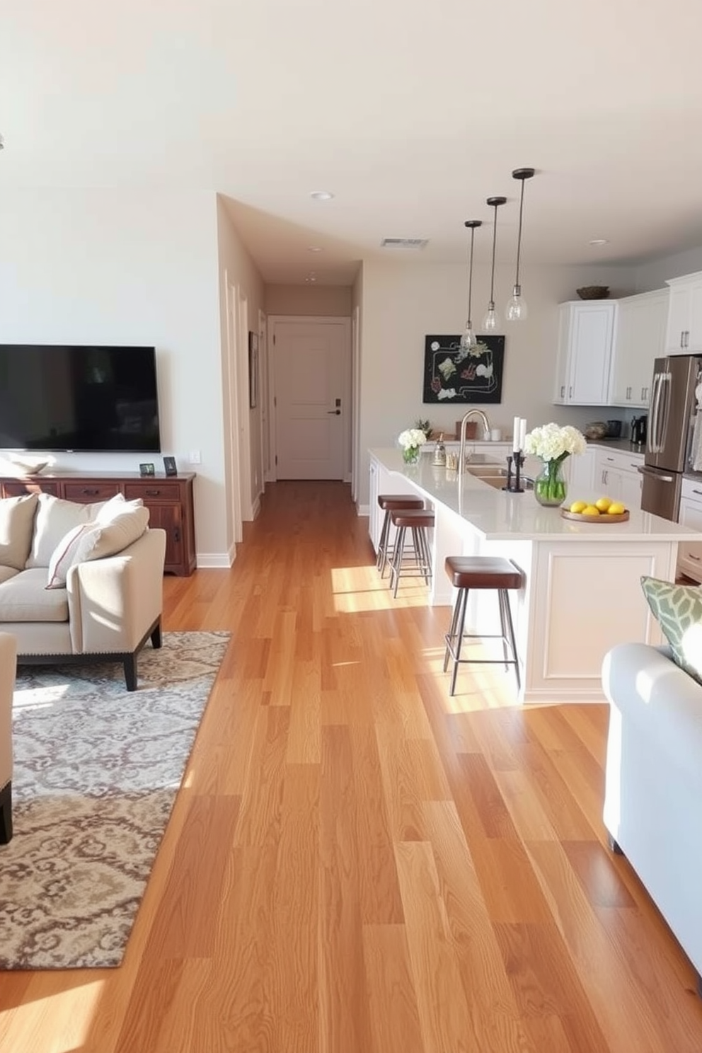 Create a seamless flow with hardwood floors that extend from the living area into the kitchen. The open kitchen features a large island with bar seating, stainless steel appliances, and sleek cabinetry in a soft white finish.