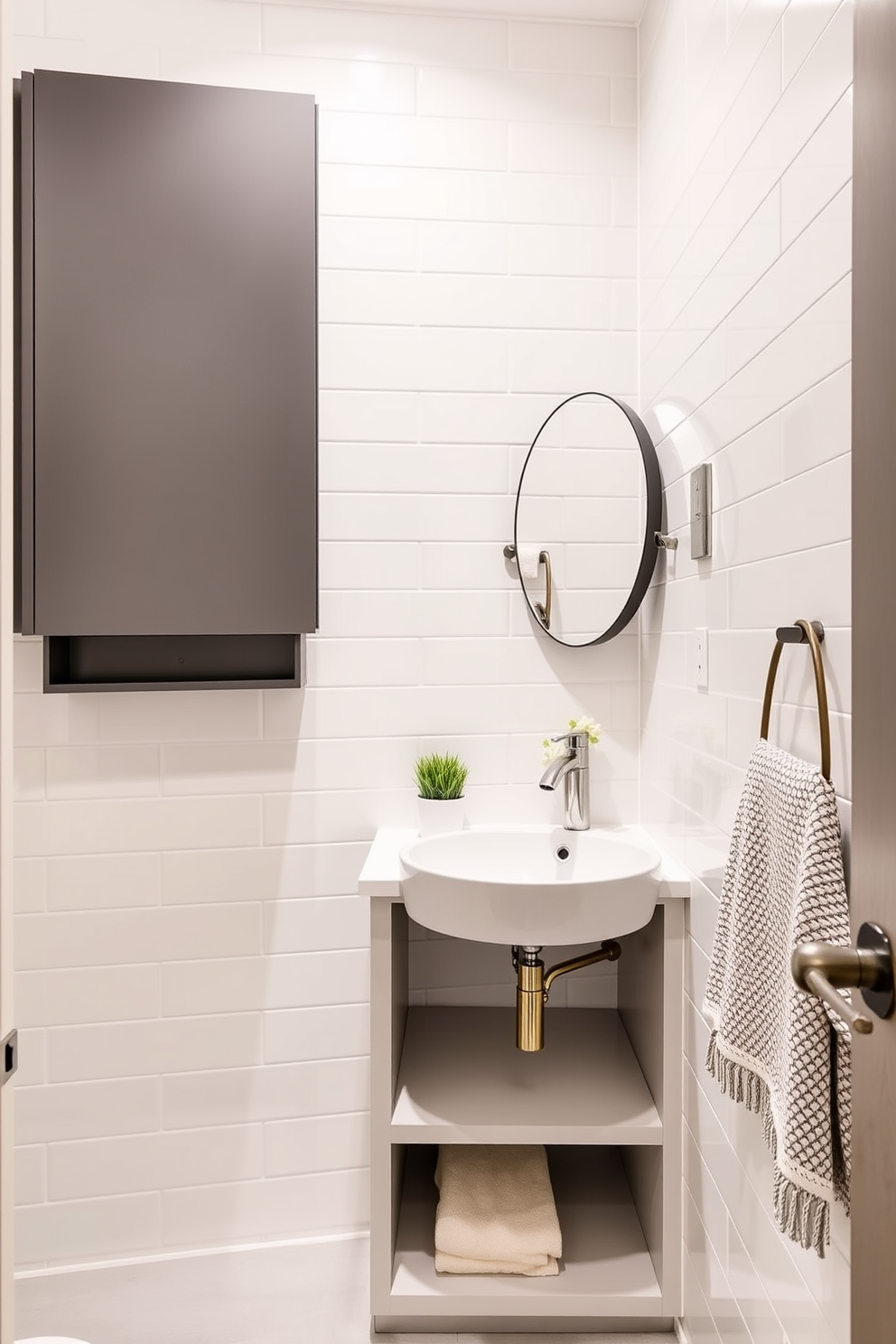 A stylish powder room featuring a compact pedestal sink with a sleek chrome faucet. The walls are adorned with elegant wallpaper in a soft pastel hue, complemented by a round mirror with a simple white frame. A built-in shelving unit is positioned above the toilet, showcasing neatly arranged decorative items and plants. The floor is finished with light-colored tiles, creating an airy feel while maximizing the limited space.