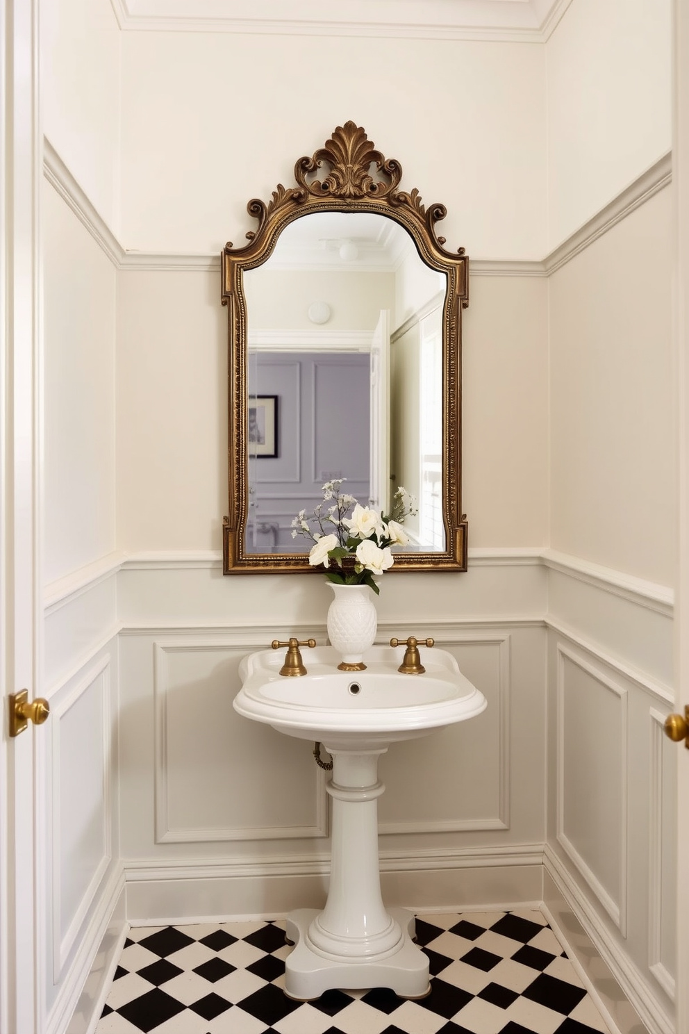 A vintage-inspired pedestal sink takes center stage in a charming powder room. The sink features intricate detailing and is paired with a classic chrome faucet, creating an elegant focal point. Soft pastel wallpaper adorns the walls, adding a touch of whimsy to the space. A small round mirror with an ornate frame hangs above the sink, reflecting the warm glow of a vintage-style light fixture.