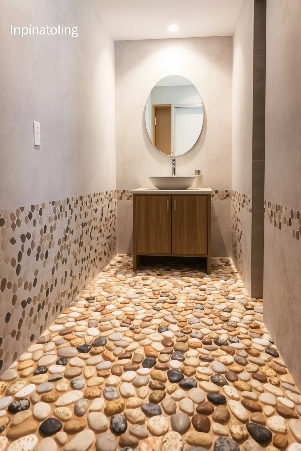 A serene powder room featuring pebble tiles that create a spa-like atmosphere. The natural textures of the stones enhance the calming ambiance while providing a unique visual appeal. Soft lighting illuminates the space, highlighting the organic shapes and colors of the pebble tiles. A minimalist wooden vanity complements the floor, creating a harmonious balance in the design.