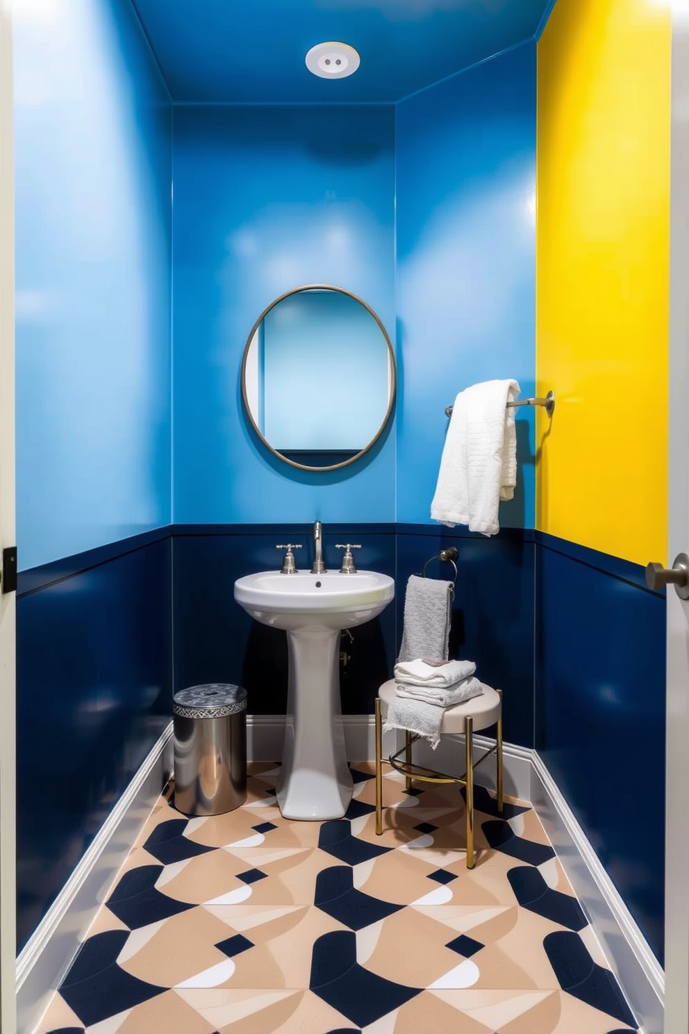 A striking powder room featuring bold color blocking with vibrant hues such as deep blue and bright yellow on opposite walls. The floor showcases a geometric tile pattern in contrasting colors that enhances the dramatic effect of the space.