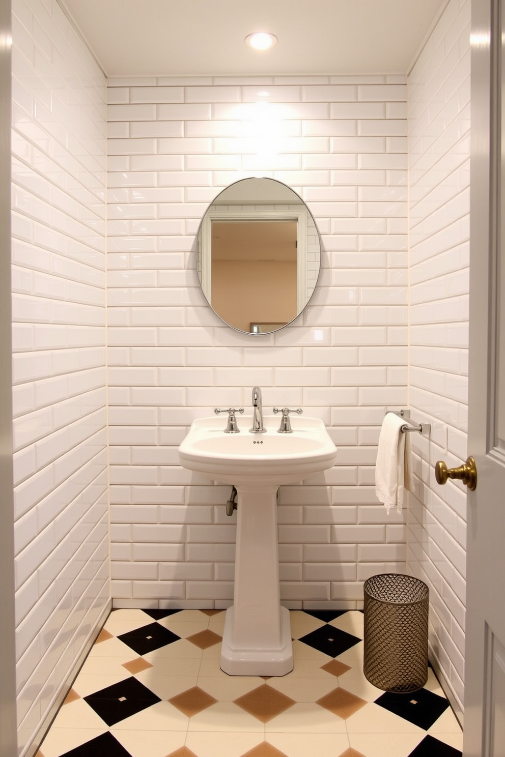 A chic powder room featuring glossy subway tiles that reflect light beautifully. The walls are adorned with these tiles in a classic white, creating a clean and modern aesthetic. The floor is designed with geometric patterned tiles in contrasting colors that add visual interest. A sleek pedestal sink complements the overall design, enhancing the elegant feel of the space.