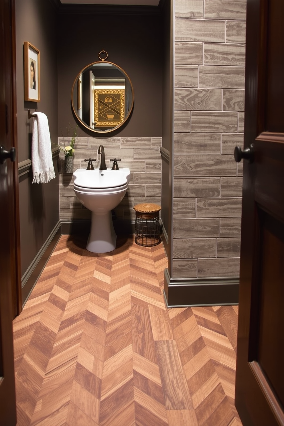 A cozy powder room featuring wood look tiles that add warmth and charm to the space. The floor is adorned with a herringbone pattern of rich brown and beige tones, creating a welcoming atmosphere.