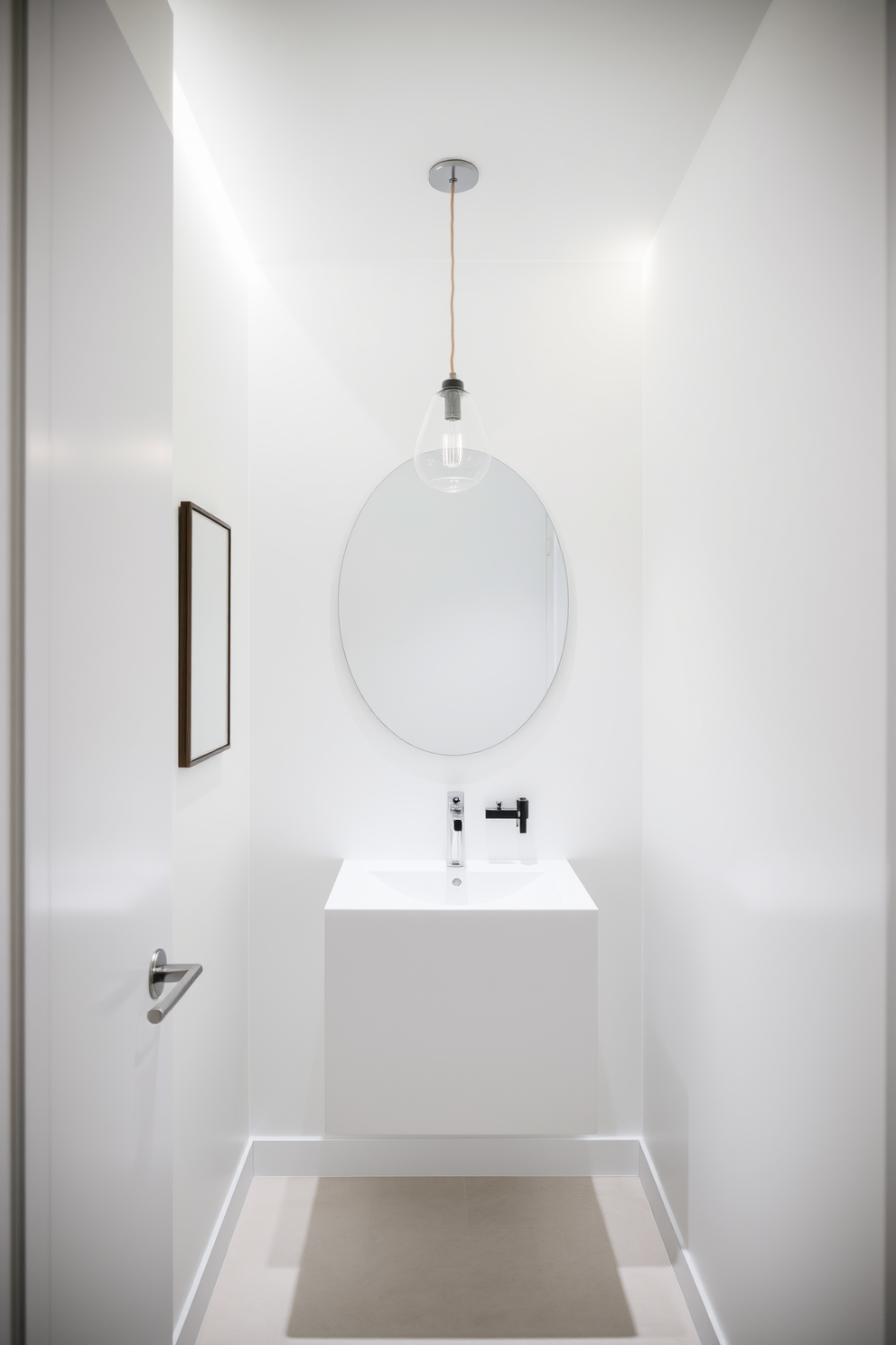 A sleek powder room featuring minimalist fixtures for a clean and uncluttered design. The space is illuminated by soft, ambient lighting that enhances the simplicity of the decor. The walls are painted in a crisp white, creating a bright and airy feel. A single, elegant pendant light hangs above the floating vanity, providing both function and style.