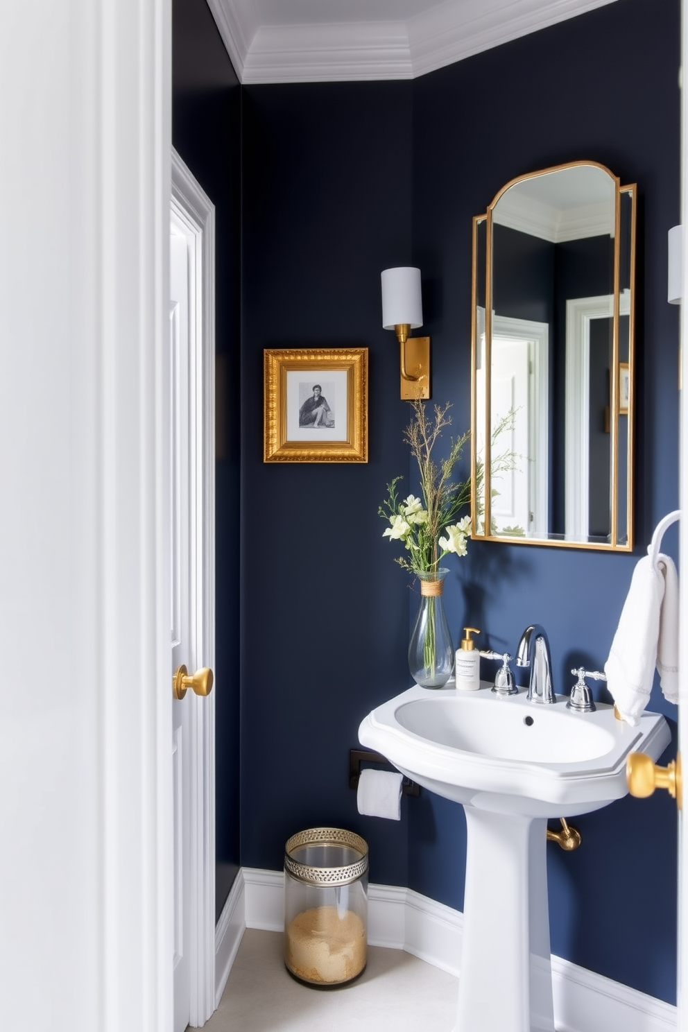 A bold navy blue powder room creates a dramatic and inviting atmosphere. The walls are painted in a rich navy hue, complemented by white trim and fixtures for a striking contrast. A sleek pedestal sink with a polished chrome faucet serves as the focal point of the space. Decorative accents like gold-framed artwork and a stylish mirror enhance the elegance of the design.