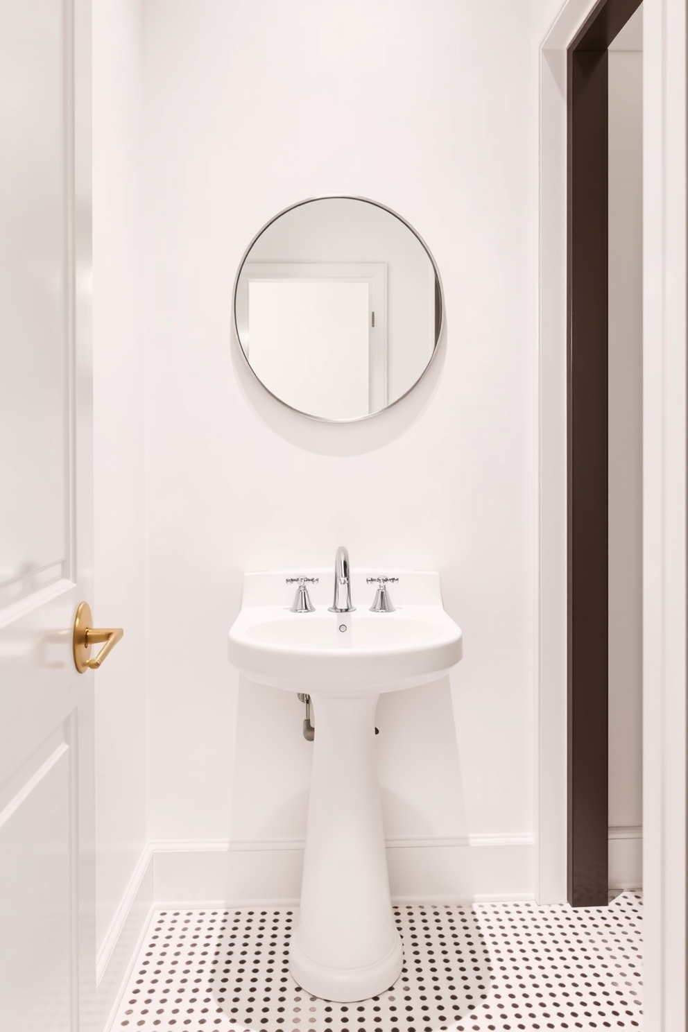 A crisp ivory powder room exudes elegance and simplicity. The walls are painted in a fresh ivory hue, creating a clean slate that enhances the space's brightness. A sleek pedestal sink with a polished chrome faucet stands as a focal point. Above it, a round mirror with a thin metallic frame reflects the light, adding depth to the design.