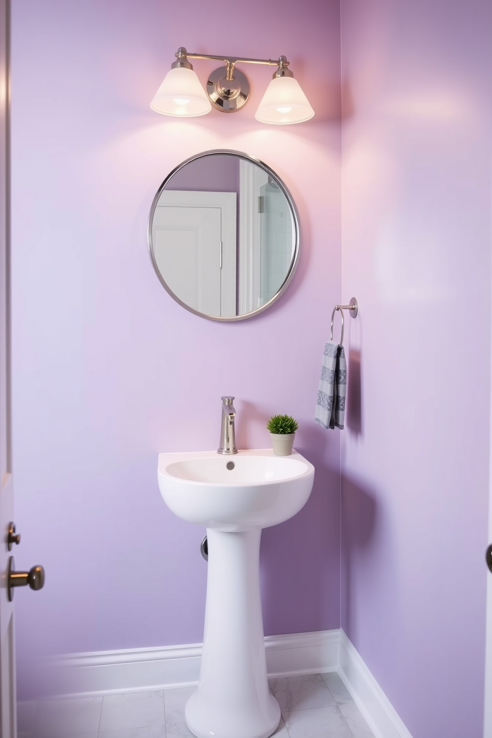 A serene powder room with muted lavender walls that create a calming atmosphere. The space features a sleek white pedestal sink with a brushed nickel faucet and a round mirror framed in polished chrome. Soft lighting fixtures provide a warm glow, highlighting the elegant decor. A small potted plant sits on the countertop, adding a touch of greenery to the tranquil setting.