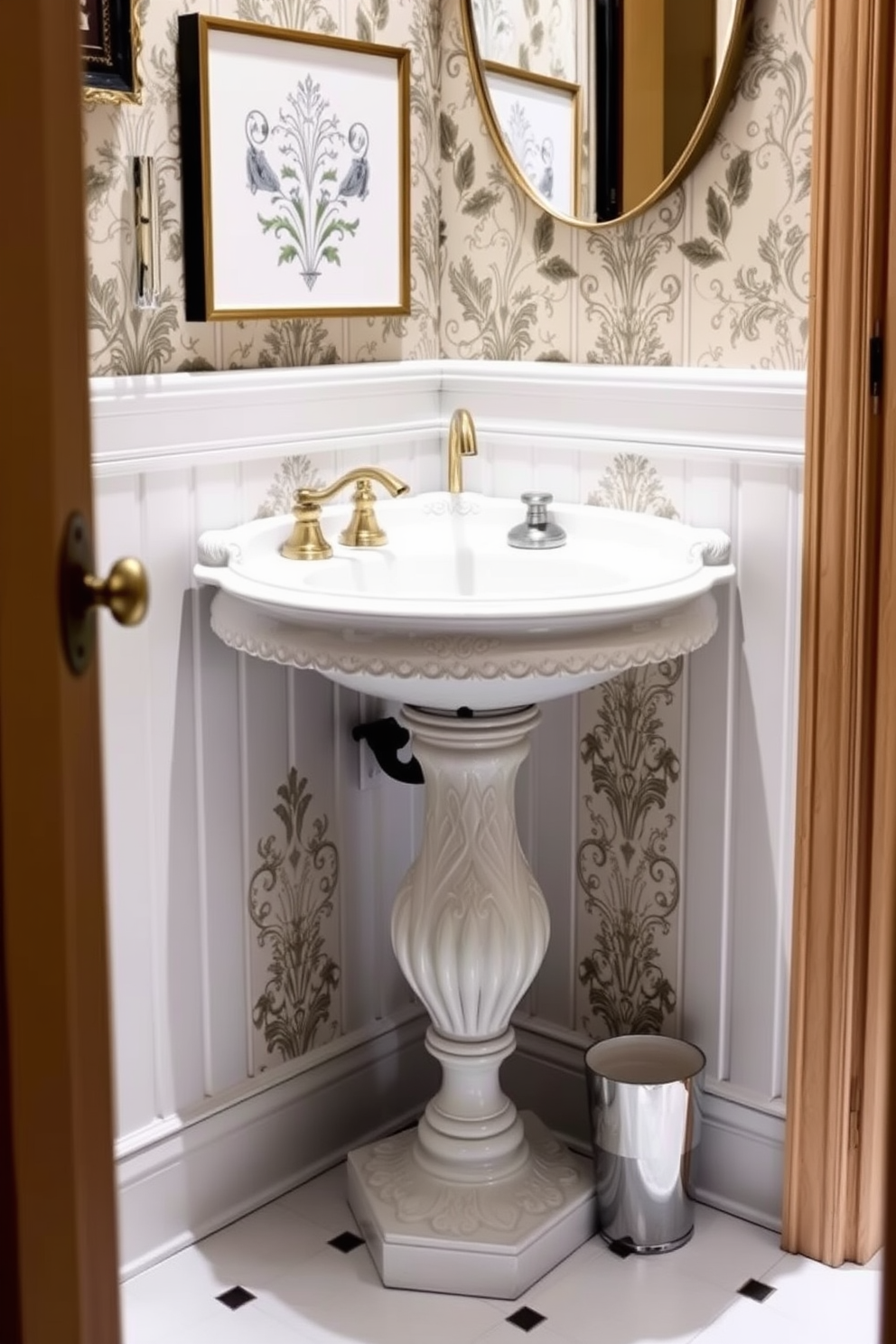 A stylish powder room featuring a sink with a decorative pedestal base. The sink is elegantly designed with intricate detailing, and the surrounding walls are adorned with a chic wallpaper that complements the overall aesthetic.