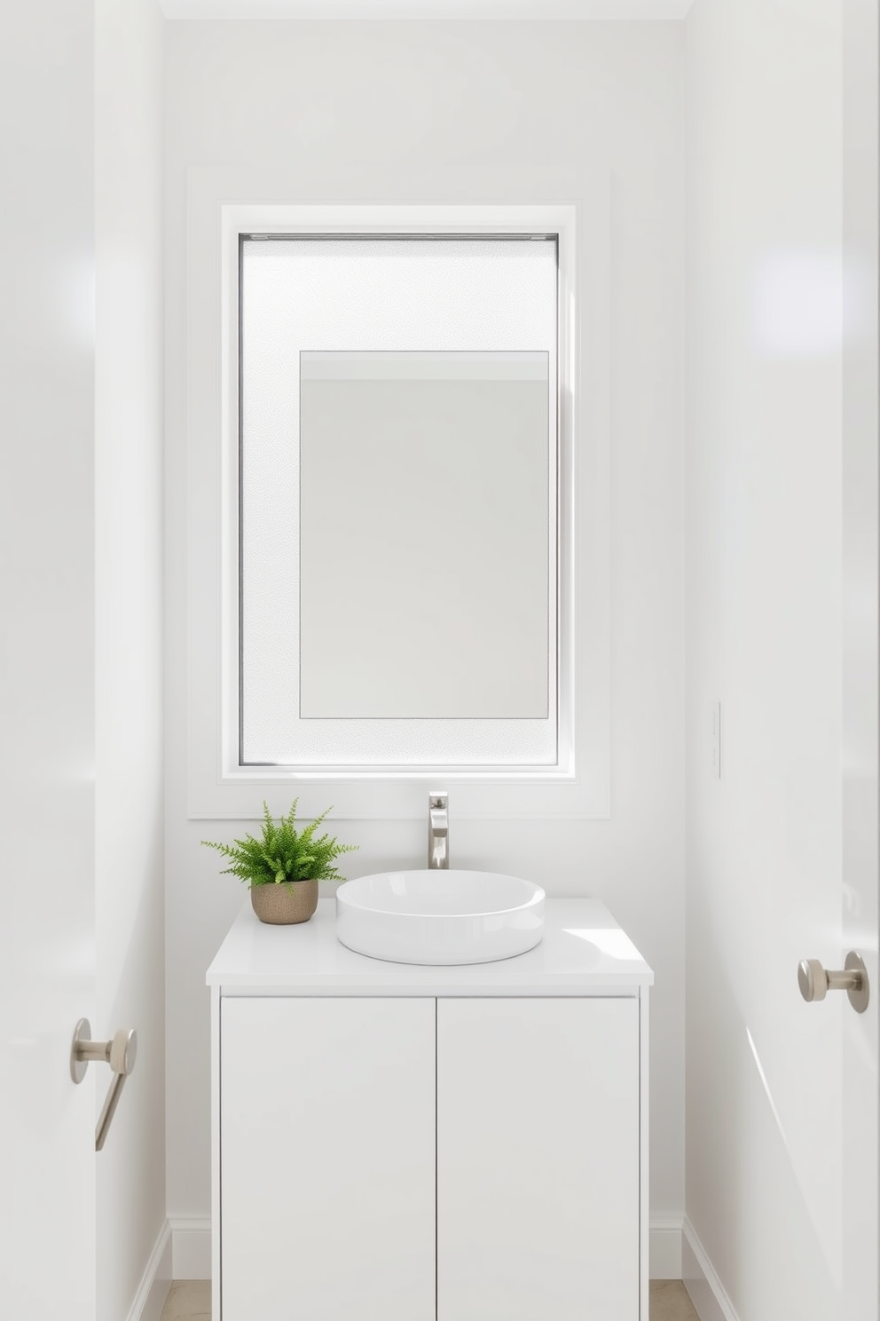 A minimalist white vanity with clean lines is the focal point of this powder room. The sleek design features a single basin sink and a simple mirror above, creating an uncluttered and serene atmosphere. Soft natural light filters in through a frosted window, enhancing the bright and airy feel of the space. Subtle greenery in a small planter adds a touch of life to the otherwise crisp and modern design.