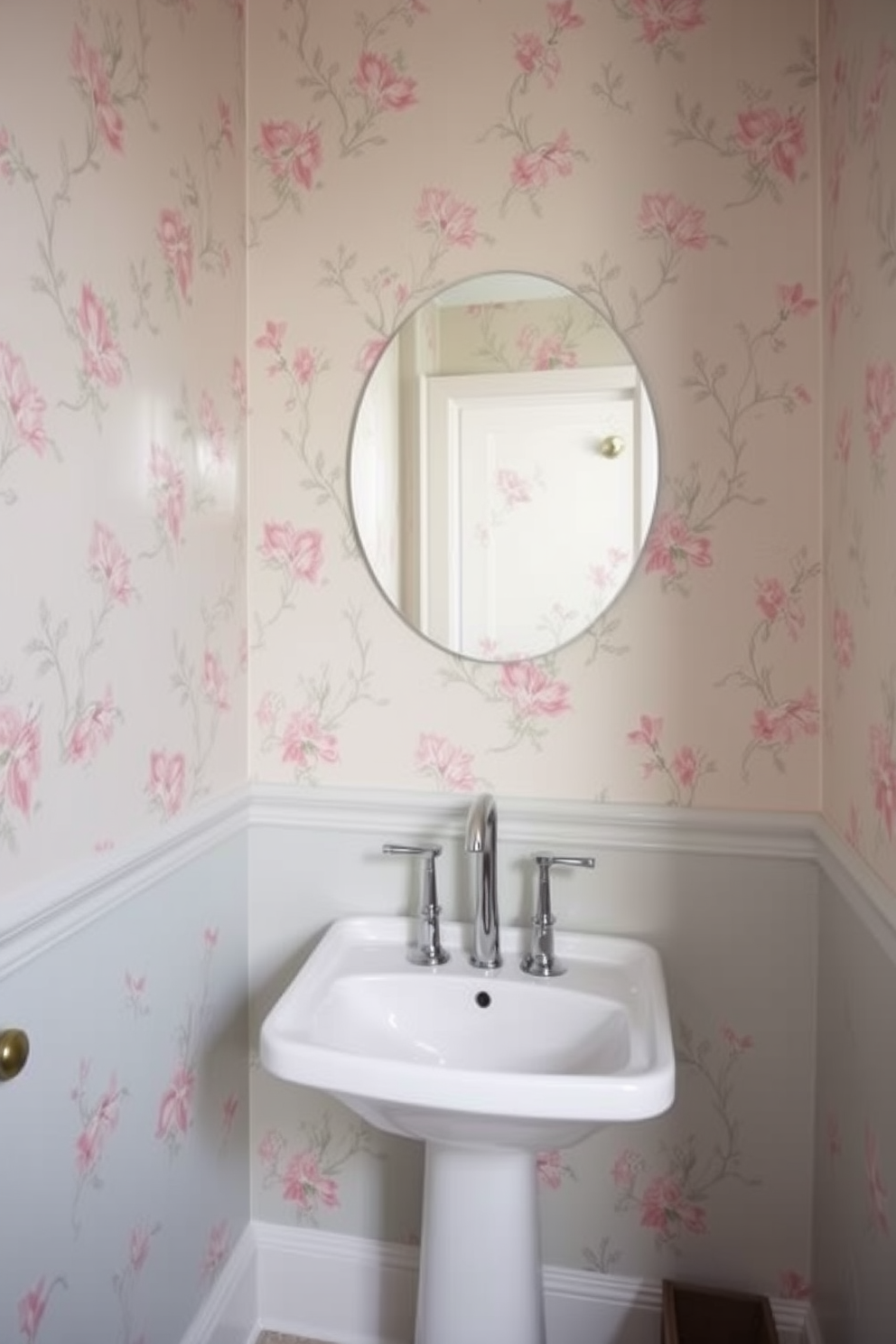 A serene powder room featuring soft pastel wallpaper that creates a calming atmosphere. The walls are adorned with delicate floral patterns in shades of blush pink and light mint green, complemented by a sleek white pedestal sink.