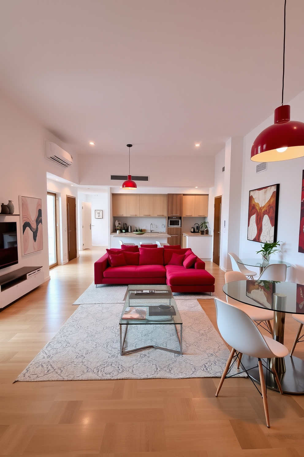 A contemporary apartment setting featuring a spacious living room with an open floor plan. The walls are adorned with abstract art, and a plush red sectional sofa is positioned around a sleek glass coffee table. Red lighting fixtures hang from the ceiling, casting a warm glow throughout the space. A stylish dining area with a round table and modern chairs complements the overall design, while a small indoor plant adds a touch of greenery.