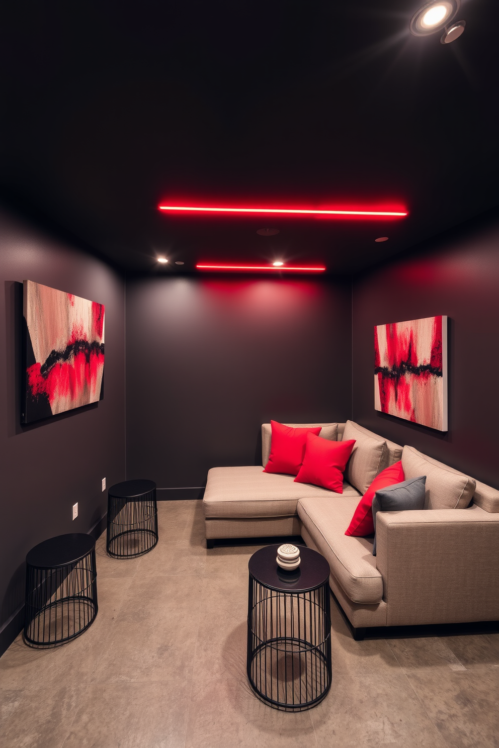 A modern basement design featuring sleek red lighting fixtures that create a warm and inviting ambiance. The walls are painted in a deep charcoal color, and the flooring is a polished concrete that complements the contemporary aesthetic. In one corner, a cozy seating area is arranged with a plush sectional sofa adorned with vibrant red and gray throw pillows. Accent tables in black metal provide a stylish contrast, while a large abstract artwork with red tones hangs above the sofa, tying the space together.