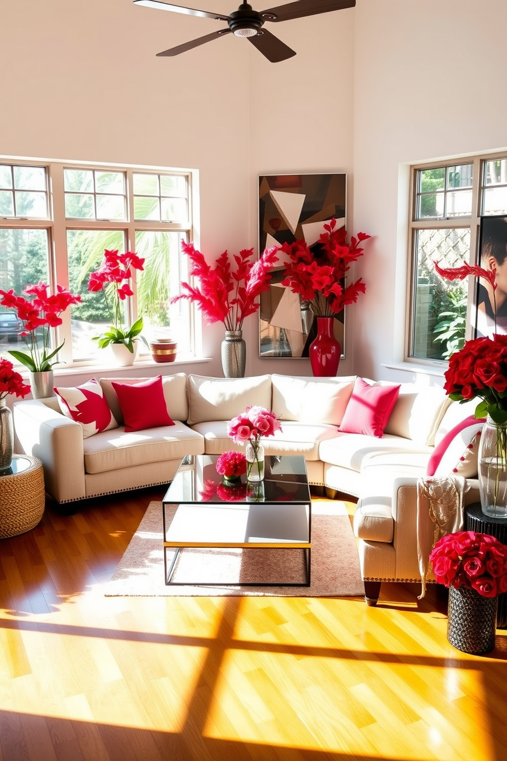 A vibrant family room filled with energy. The space features a plush sectional sofa adorned with red and white throw pillows, complemented by a sleek coffee table at the center. Bright red floral arrangements are strategically placed throughout the room to enhance the freshness of the decor. Large windows allow natural light to flood in, illuminating the warm wooden flooring and creating an inviting atmosphere.