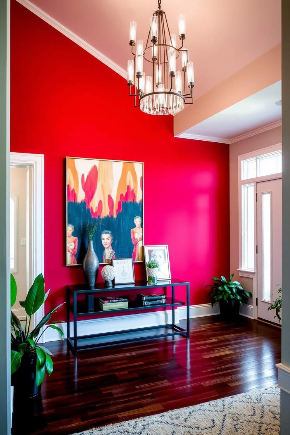 A bold red accent wall serves as the focal point of the foyer, adorned with an eclectic display of framed artwork that adds personality to the space. The floor is finished with sleek black tiles, while a stylish console table sits against the wall, complemented by a modern lamp and decorative accessories. The foyer features a striking combination of bright red and neutral tones, creating a vibrant yet welcoming atmosphere. A large mirror hangs above the console table, reflecting the art and enhancing the sense of space.