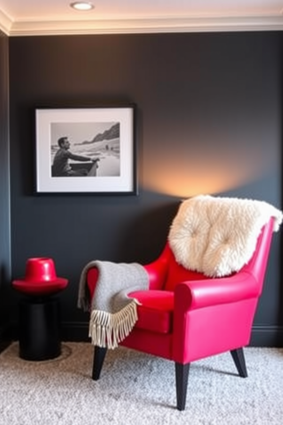 A cozy man cave featuring a bold red accent chair positioned in the corner. The walls are painted in deep charcoal gray, complemented by soft ambient lighting that creates a warm atmosphere.