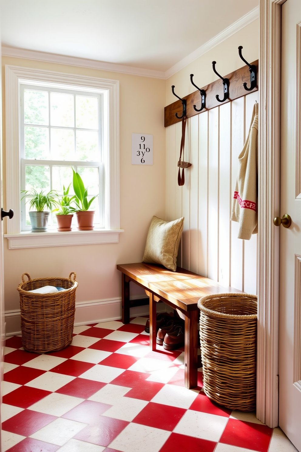 A charming mudroom with a red and white checkered floor that adds a vibrant touch to the space. The walls are painted in a soft cream color, and a rustic wooden bench with hooks above provides a welcoming entry point. Natural light pours in through a large window, illuminating a collection of potted plants on the windowsill. A woven basket sits next to the bench, offering a stylish storage solution for shoes and outdoor gear.