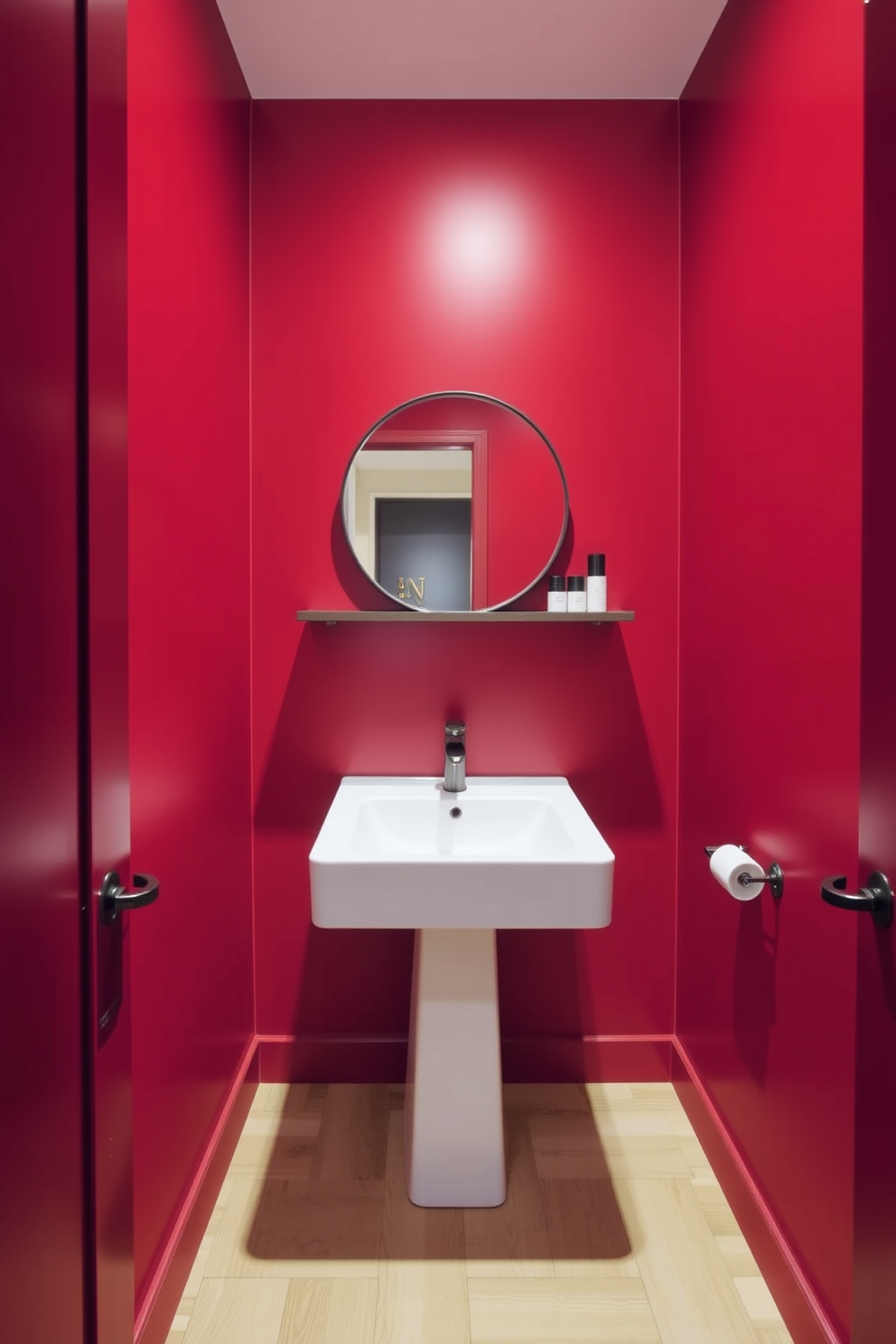 A classic red and white striped wallpaper adorns the walls of a chic powder room. The space features a sleek pedestal sink with a polished chrome faucet and a round mirror framed in white. A vintage-style chandelier hangs from the ceiling, casting a warm glow throughout the room. The floor is covered in a light gray tile that beautifully contrasts with the bold wallpaper.