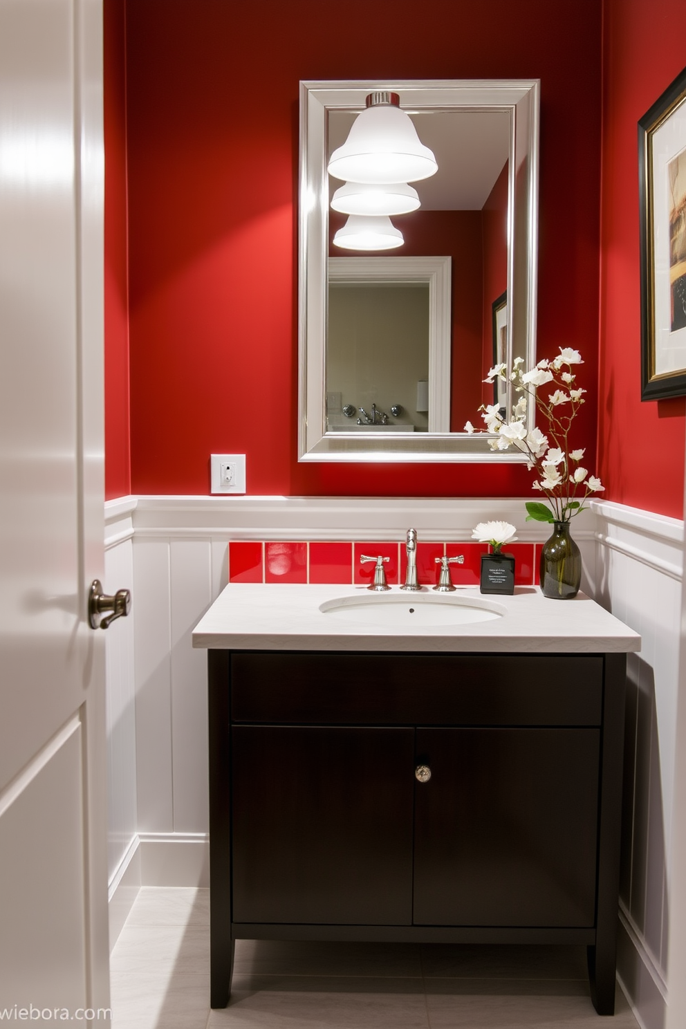 Sleek red cabinetry creates a striking focal point in a modern powder room. The bold color is complemented by minimalist fixtures and elegant lighting, enhancing the overall contemporary aesthetic. To add warmth, incorporate natural wood accents and stylish accessories. A large mirror with a simple frame reflects the vibrant cabinetry, making the space feel more expansive and inviting.