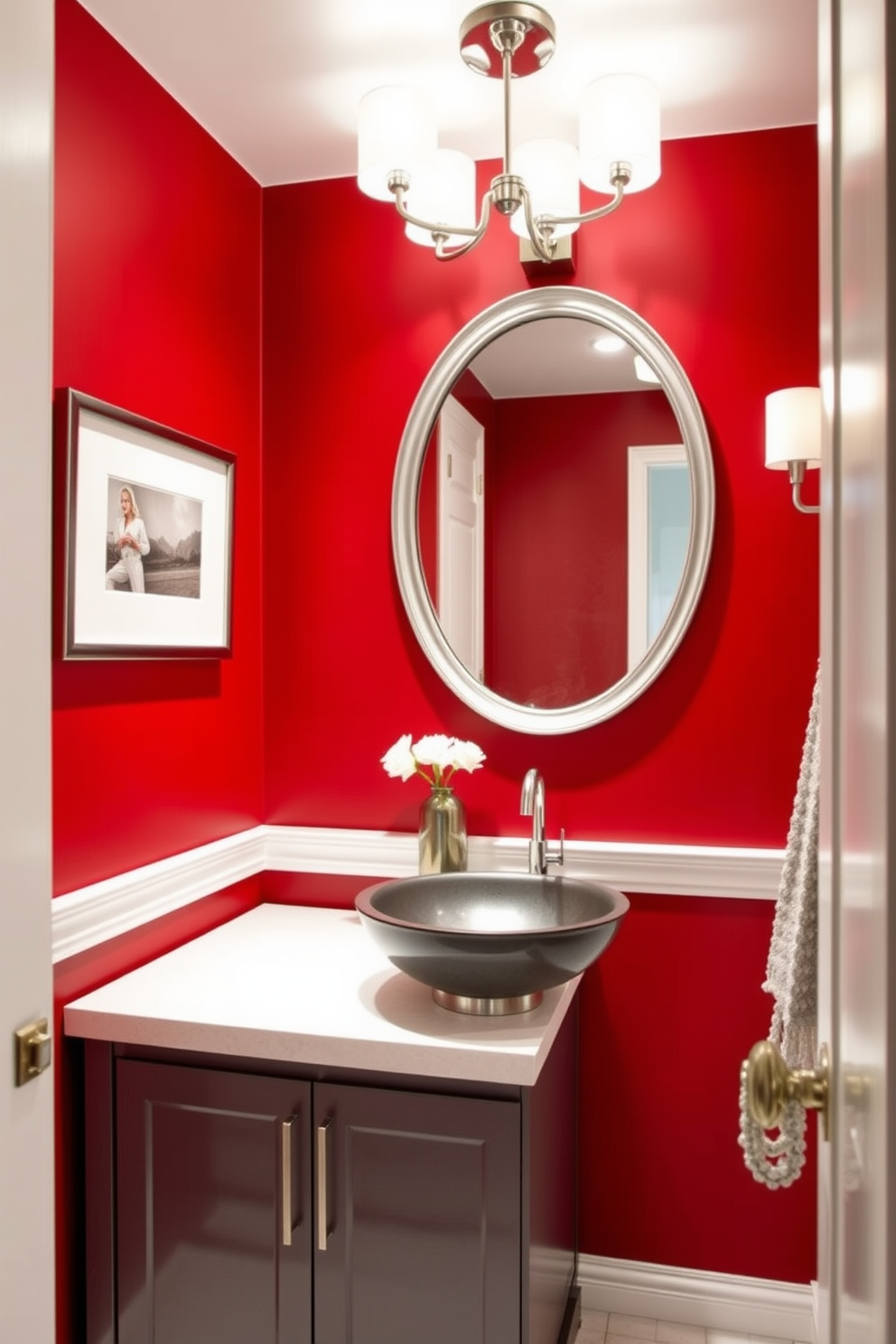 A vibrant powder room features a bright red soap dispenser and a matching toothbrush holder on a sleek white countertop. The walls are adorned with a bold geometric wallpaper in shades of red and white, creating a striking backdrop for the modern fixtures.