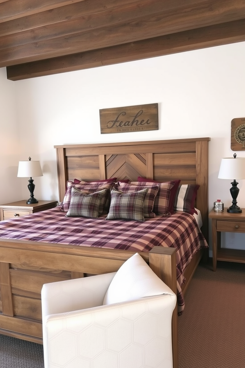 A rustic bedroom featuring farmhouse-style furniture. The bed is a large wooden frame with a distressed finish, adorned with cozy plaid bedding and layered pillows. Beside the bed, a pair of nightstands made from reclaimed wood hold vintage lamps. The walls are painted in a soft white, complemented by exposed wooden beams on the ceiling.