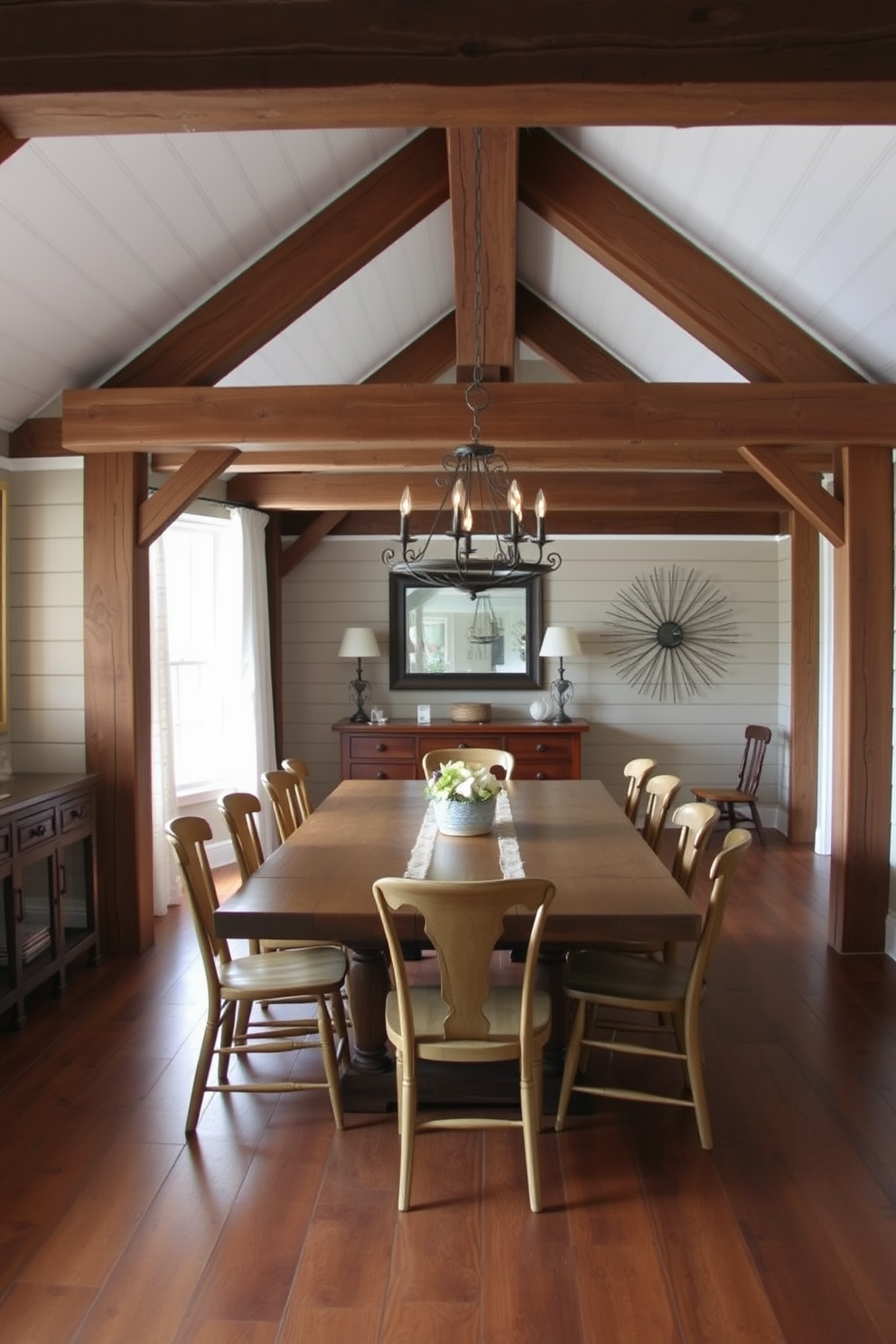 A rustic dining room featuring exposed wooden beams that add warmth and character to the space. The large farmhouse table is surrounded by mismatched chairs, creating a cozy and inviting atmosphere. A stone fireplace serves as a focal point, with a mantel adorned with seasonal decorations. Natural light floods the room through large windows, highlighting the earthy tones of the decor.