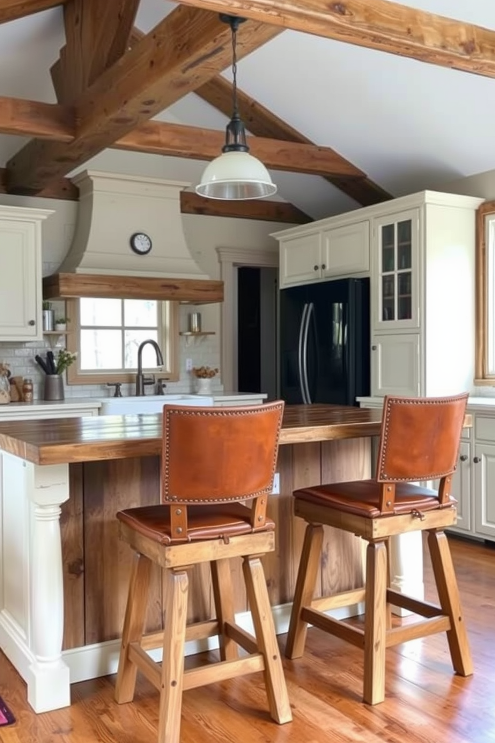 Rustic bar stools with leather accents are arranged around a reclaimed wood island. The stools feature a warm finish that complements the natural tones of the kitchen. The kitchen is designed with exposed wooden beams and a farmhouse sink. Vintage-inspired cabinetry in a soft cream color enhances the rustic charm of the space.