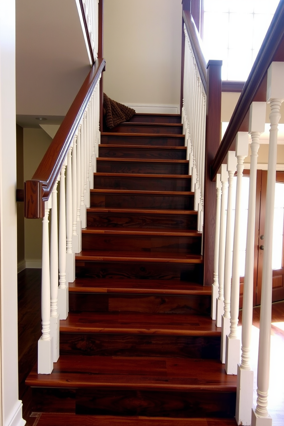 A modern rustic staircase featuring a combination of metal and wood elements. The steps are crafted from reclaimed wood, while the railing showcases sleek metal accents that enhance the overall aesthetic.