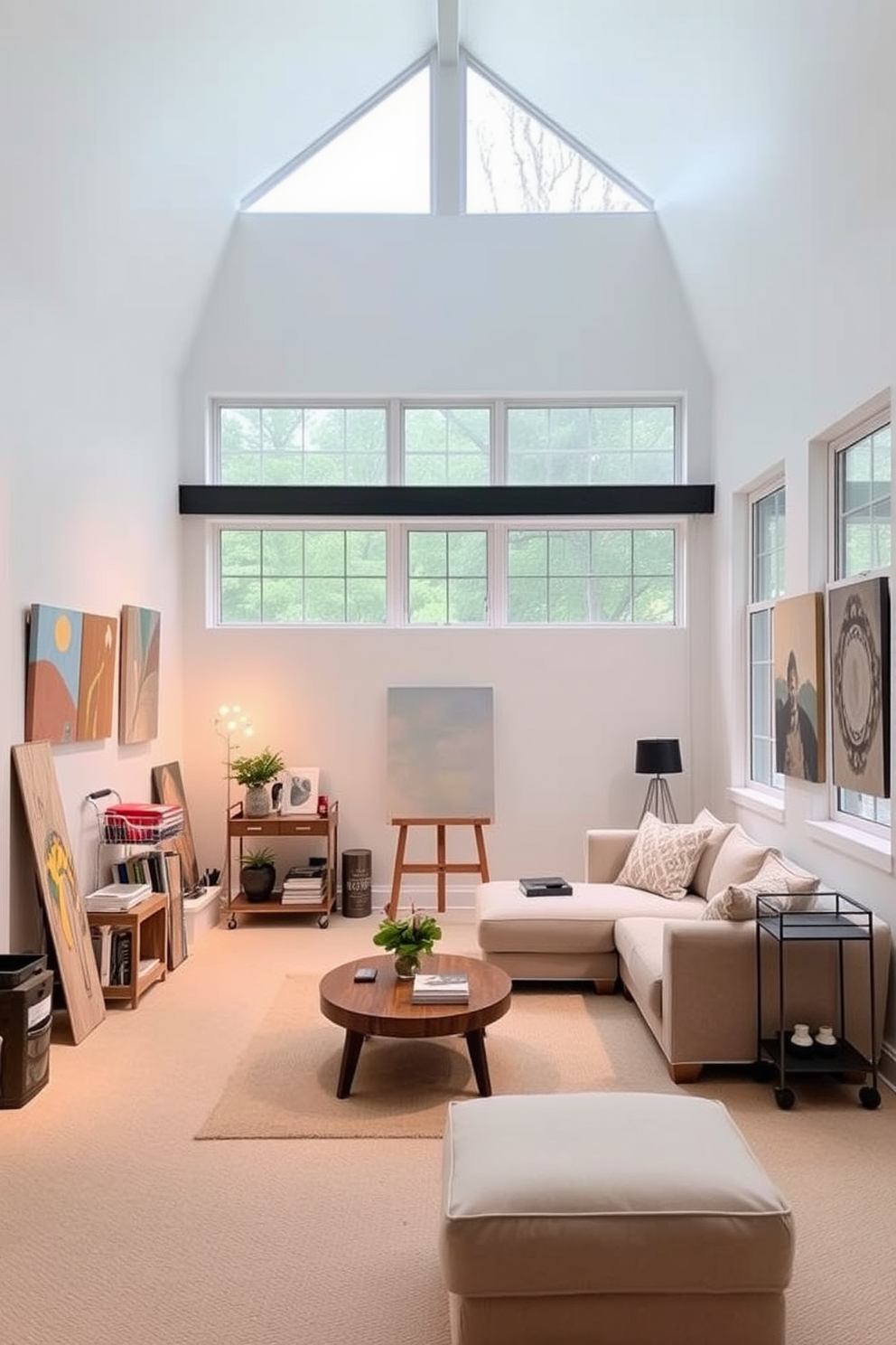 A chic art studio space featuring large windows that allow natural light to flood in. The walls are painted in a soft white, providing a clean backdrop for colorful artwork, while a large easel stands in the center of the room. Simple basement design ideas include a cozy lounge area with a plush sectional sofa and a coffee table. The space is illuminated with warm lighting, and a small bar cart is positioned against one wall for entertaining guests.