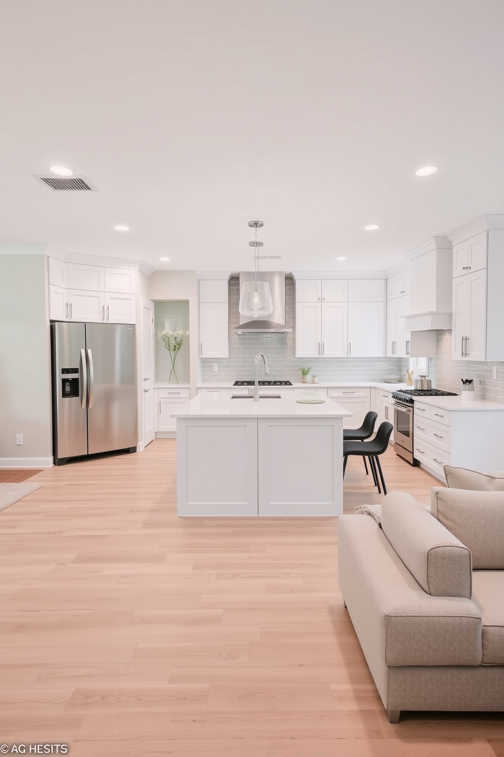 An open floor plan seamlessly integrates the kitchen with the living and dining areas, promoting a sense of spaciousness. The layout features a large island at the center, providing additional prep space and seating for casual dining. The kitchen showcases clean lines with minimalist cabinetry in a soft white finish, complemented by sleek stainless steel appliances. A subtle backsplash of light gray tiles adds texture without overwhelming the overall simplicity of the design.